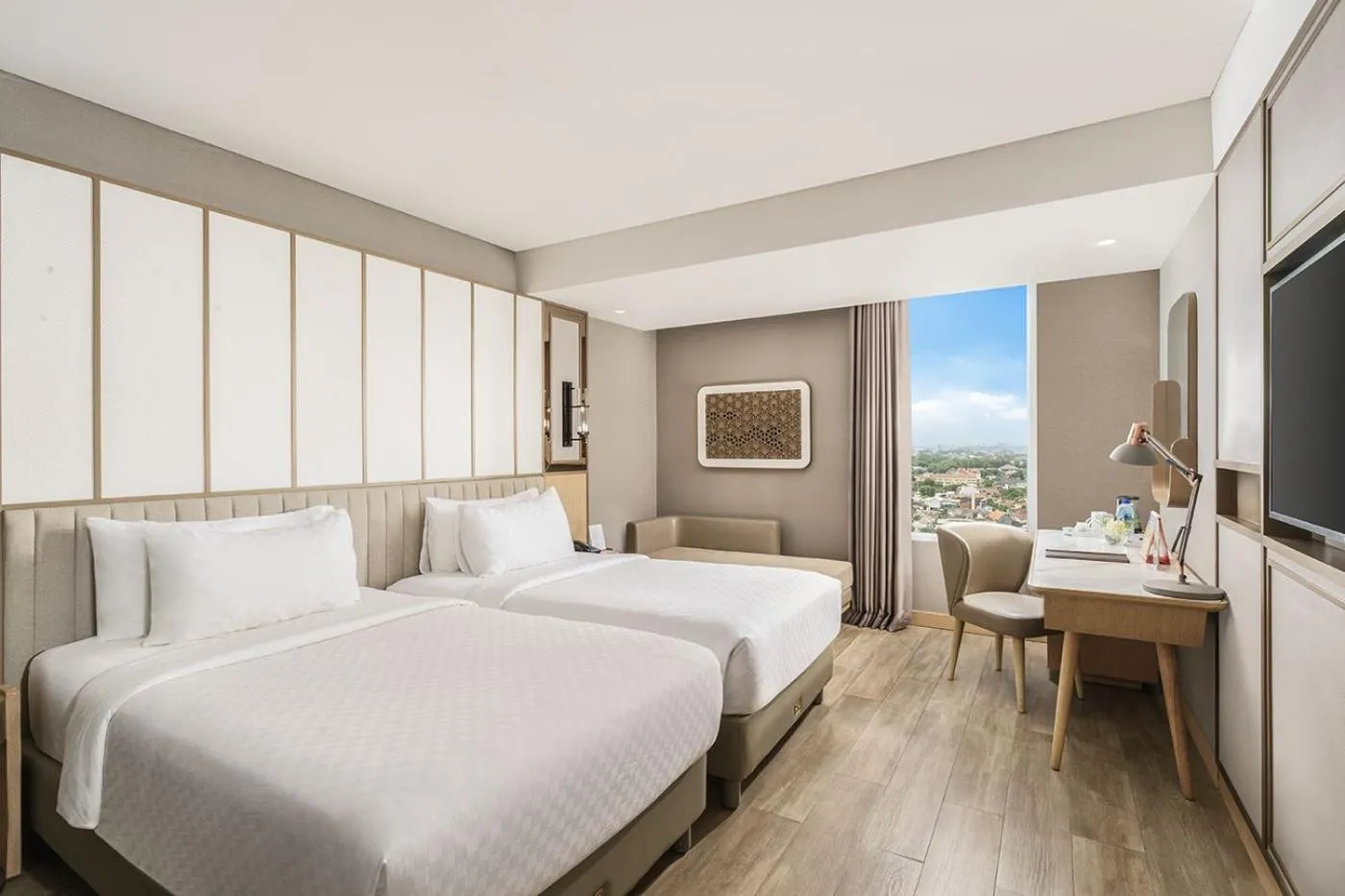 Bed in Swiss-Belhotel Solo