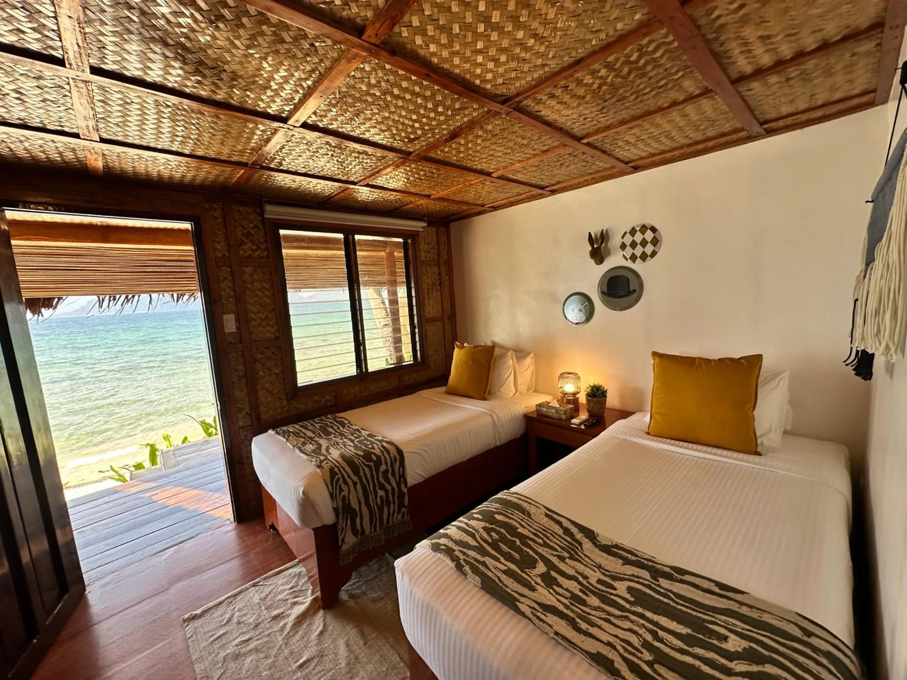 Bed in Beach Huts El Nido