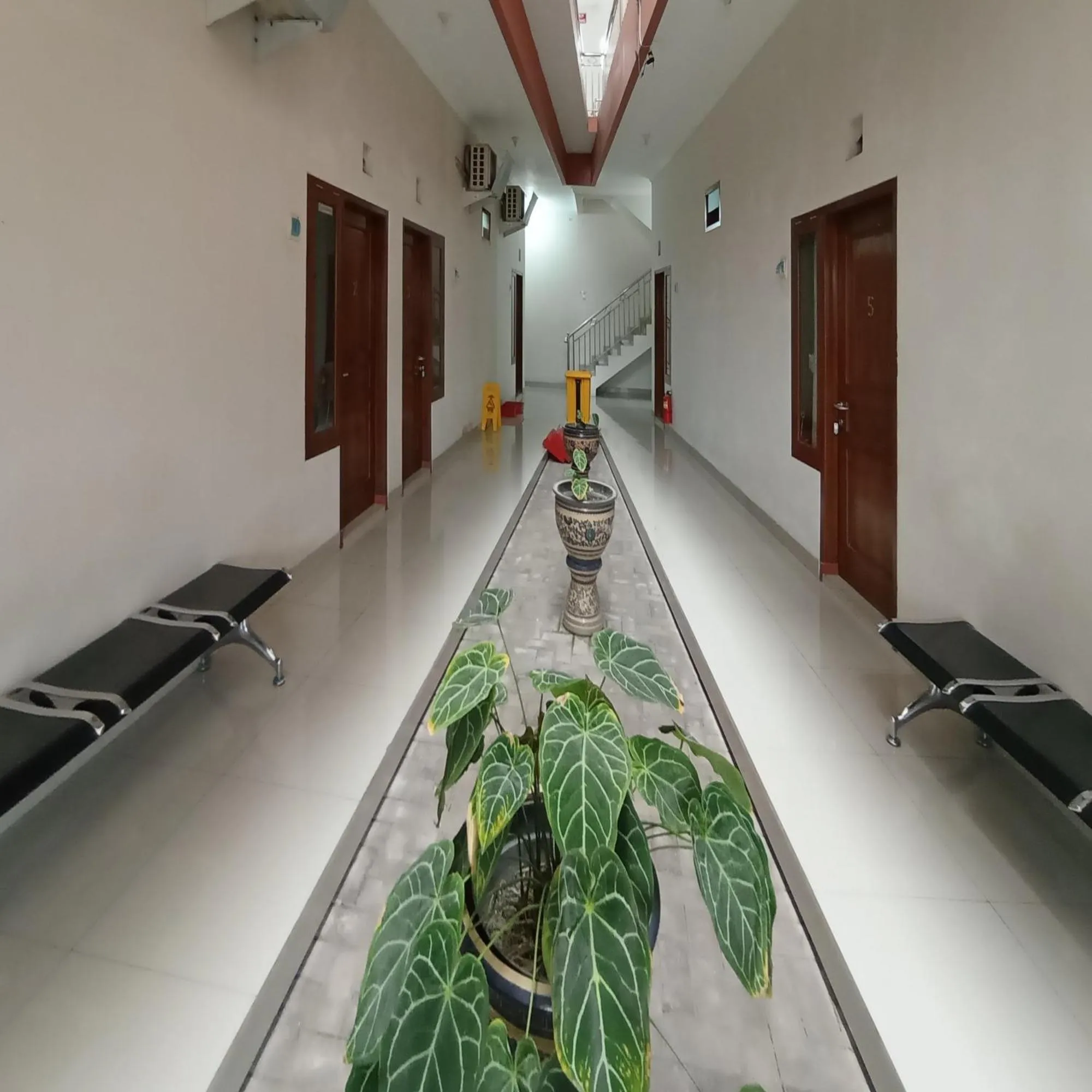 Property building in Super OYO 3314 Syariah House