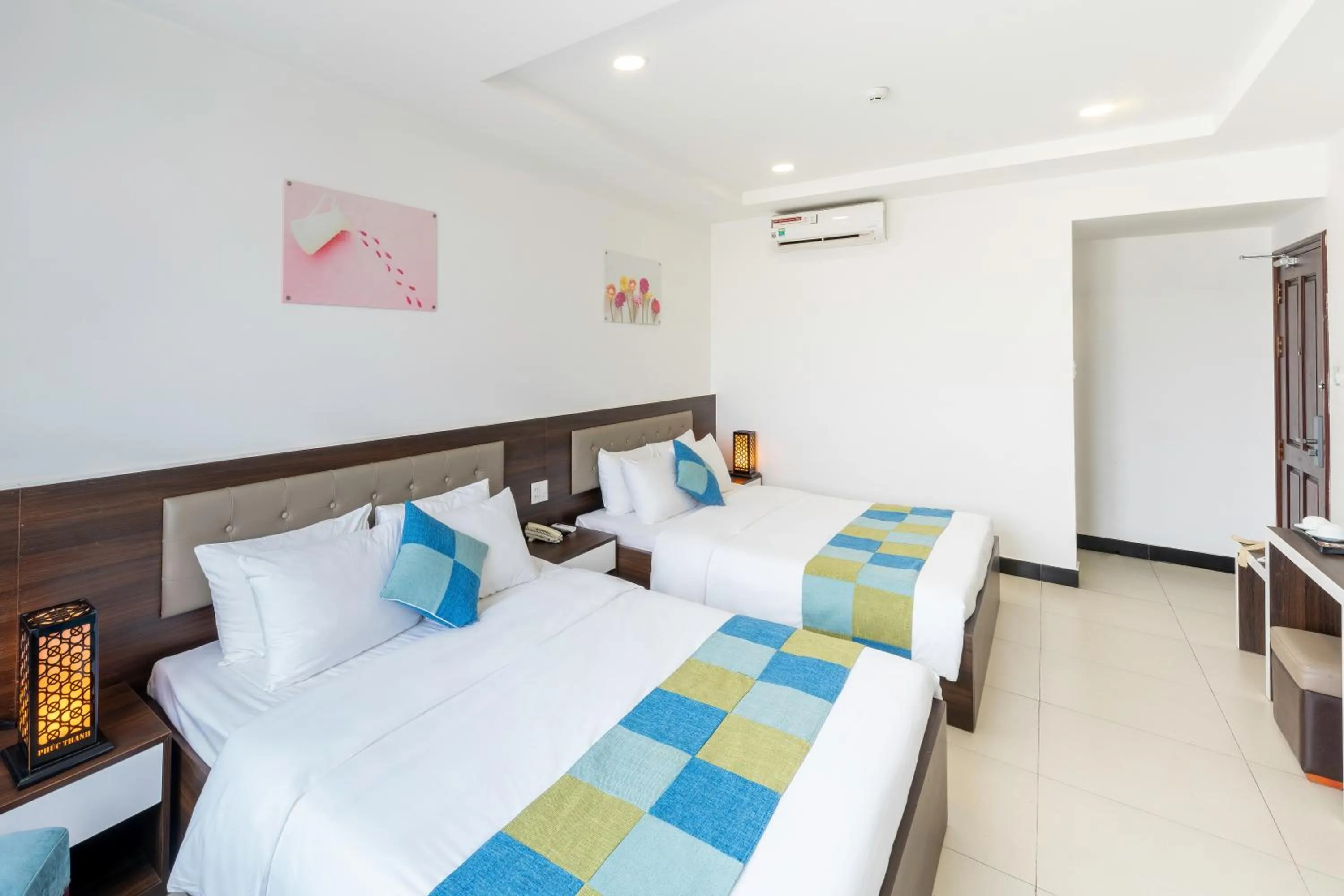 Bed in Phuc Thanh Luxury Hotel by THG