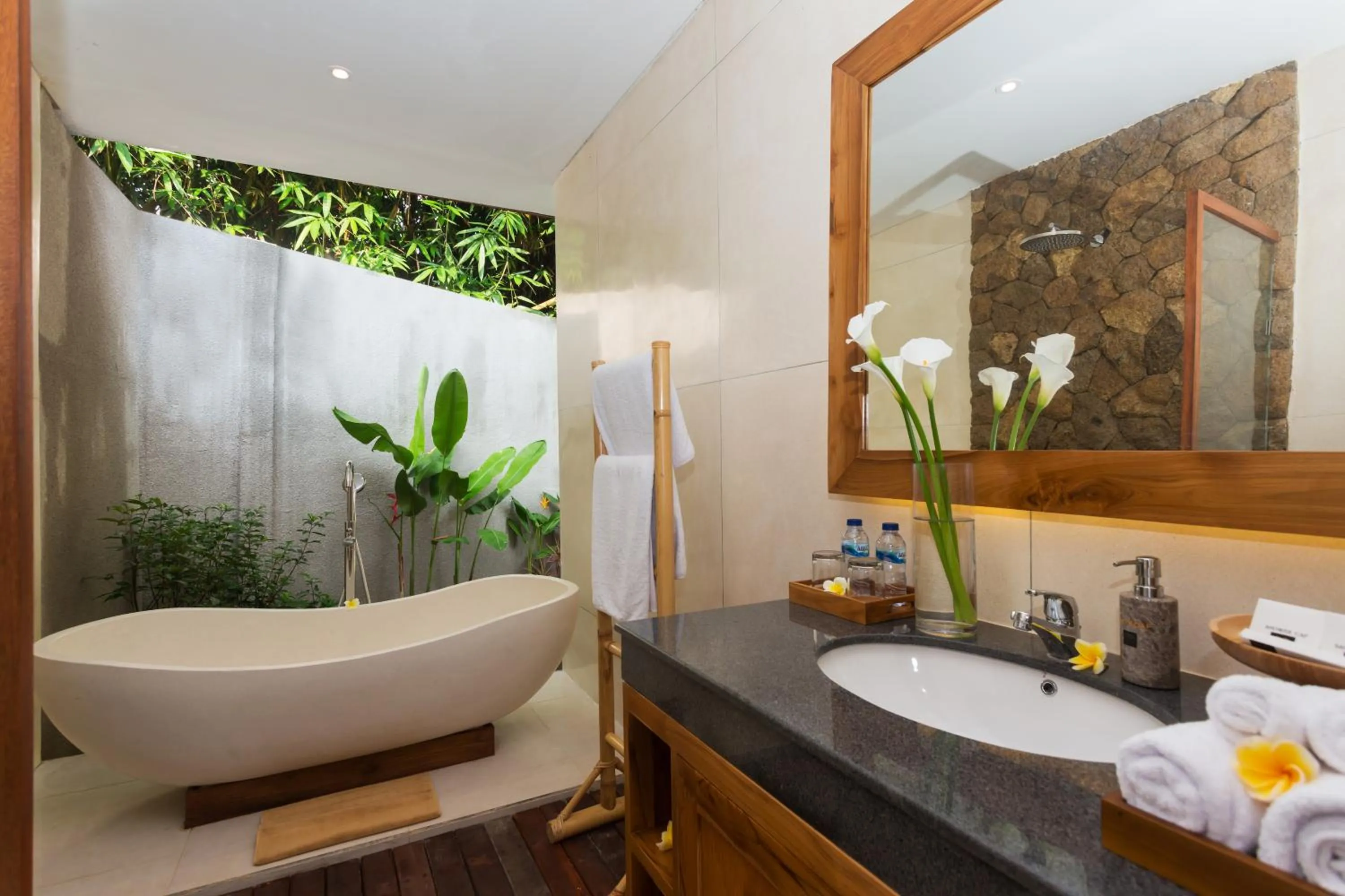 Bathroom in de Metra Villa Ubud by GenuineHost