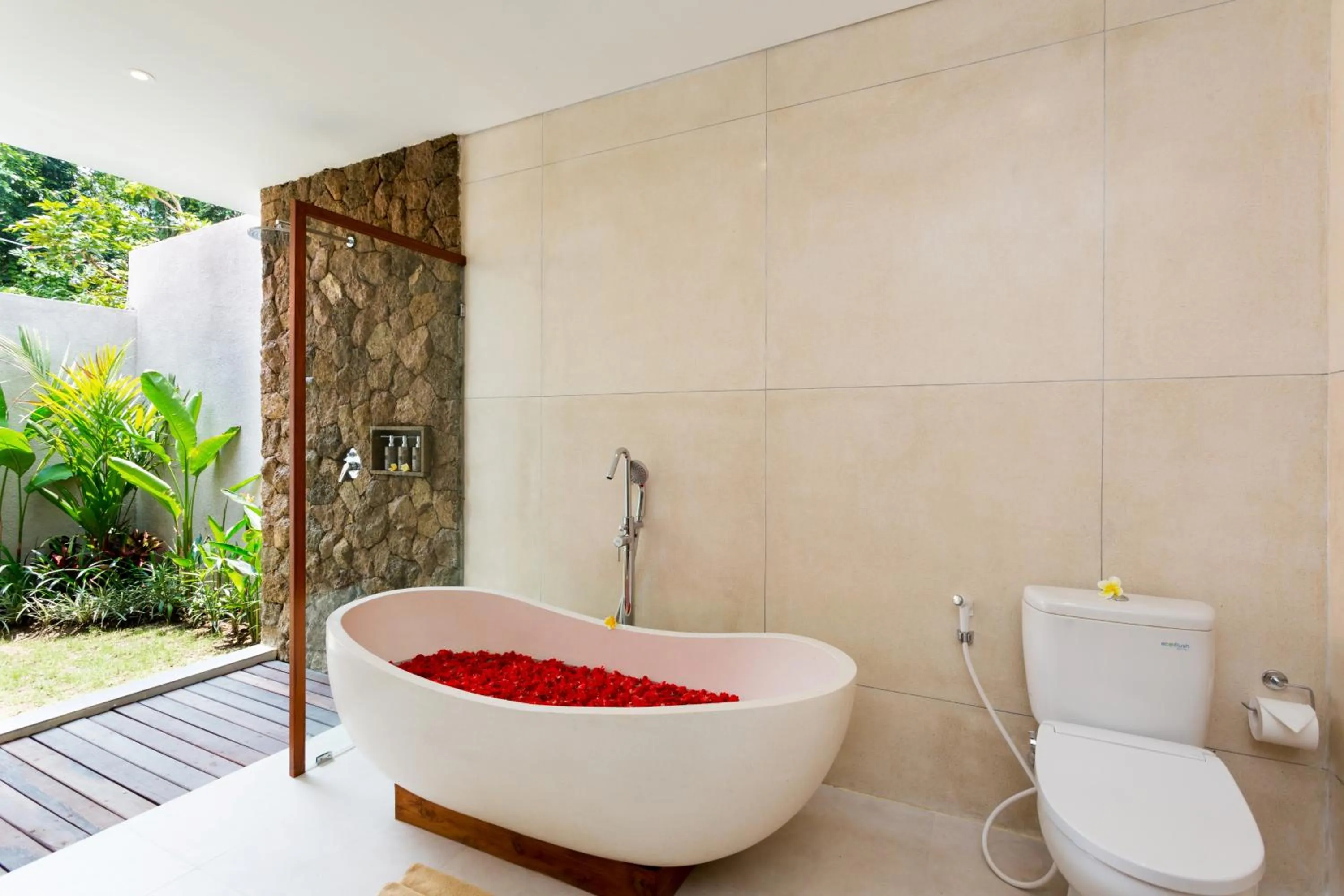 Bathroom in de Metra Villa Ubud by GenuineHost