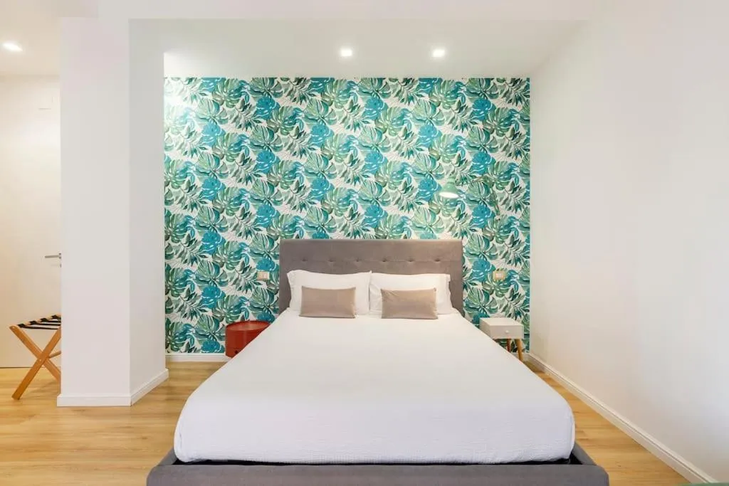 Bed in Tufo Giallo Rooms