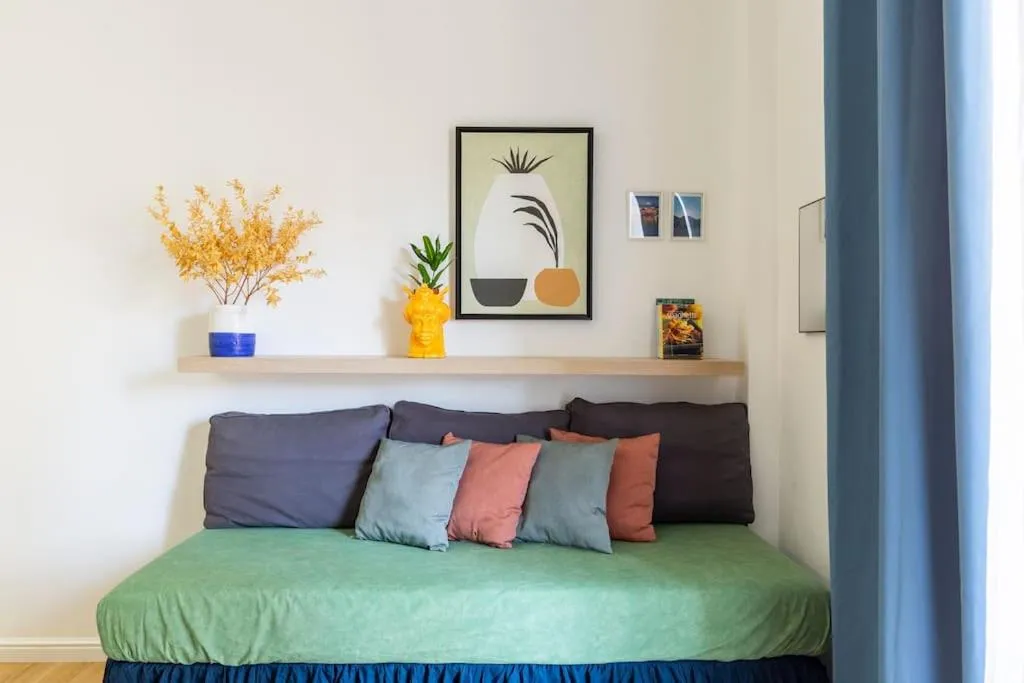 Living room, Bed in Tufo Giallo Rooms