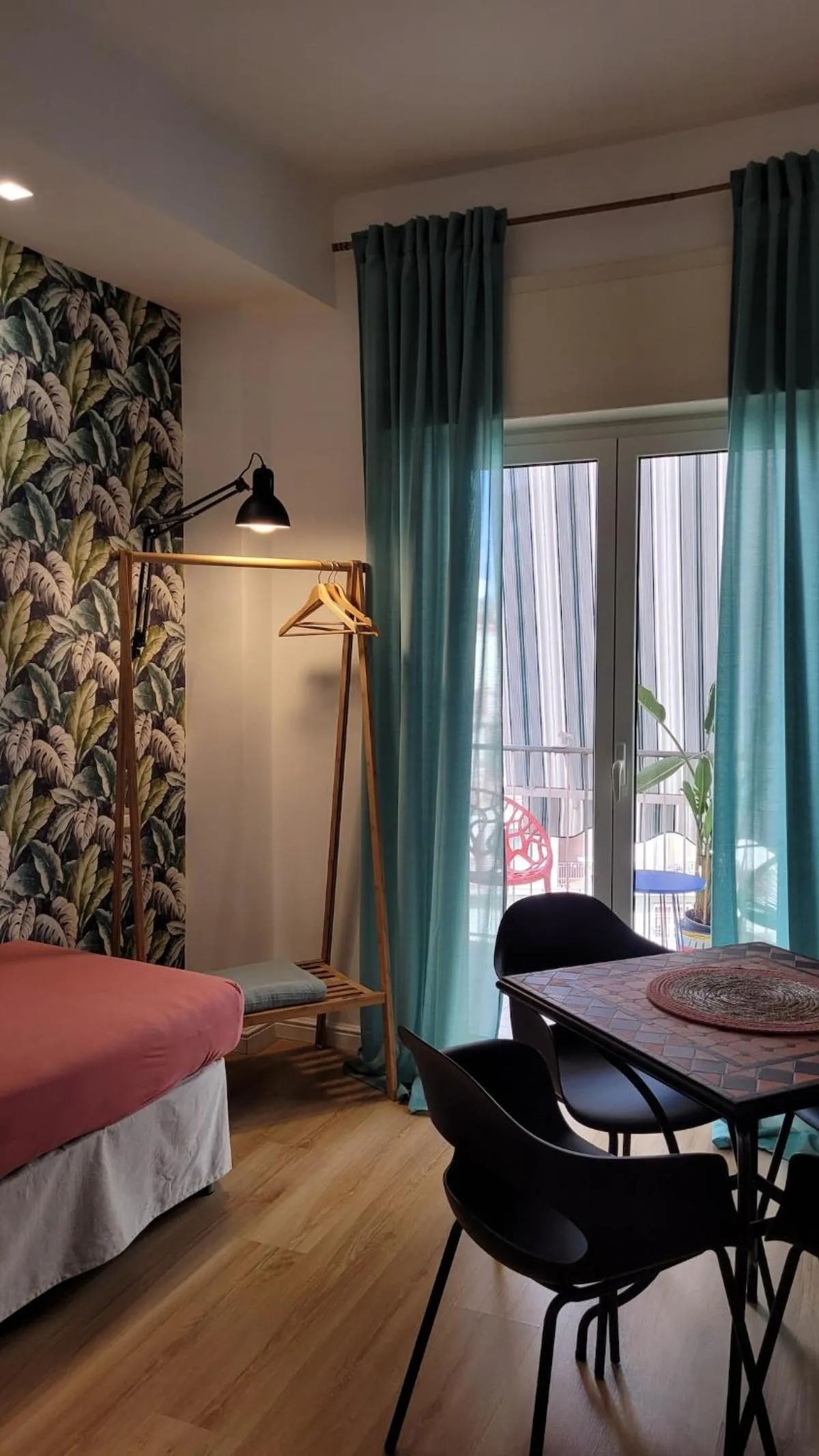 Seating area, Bed in Tufo Giallo Rooms