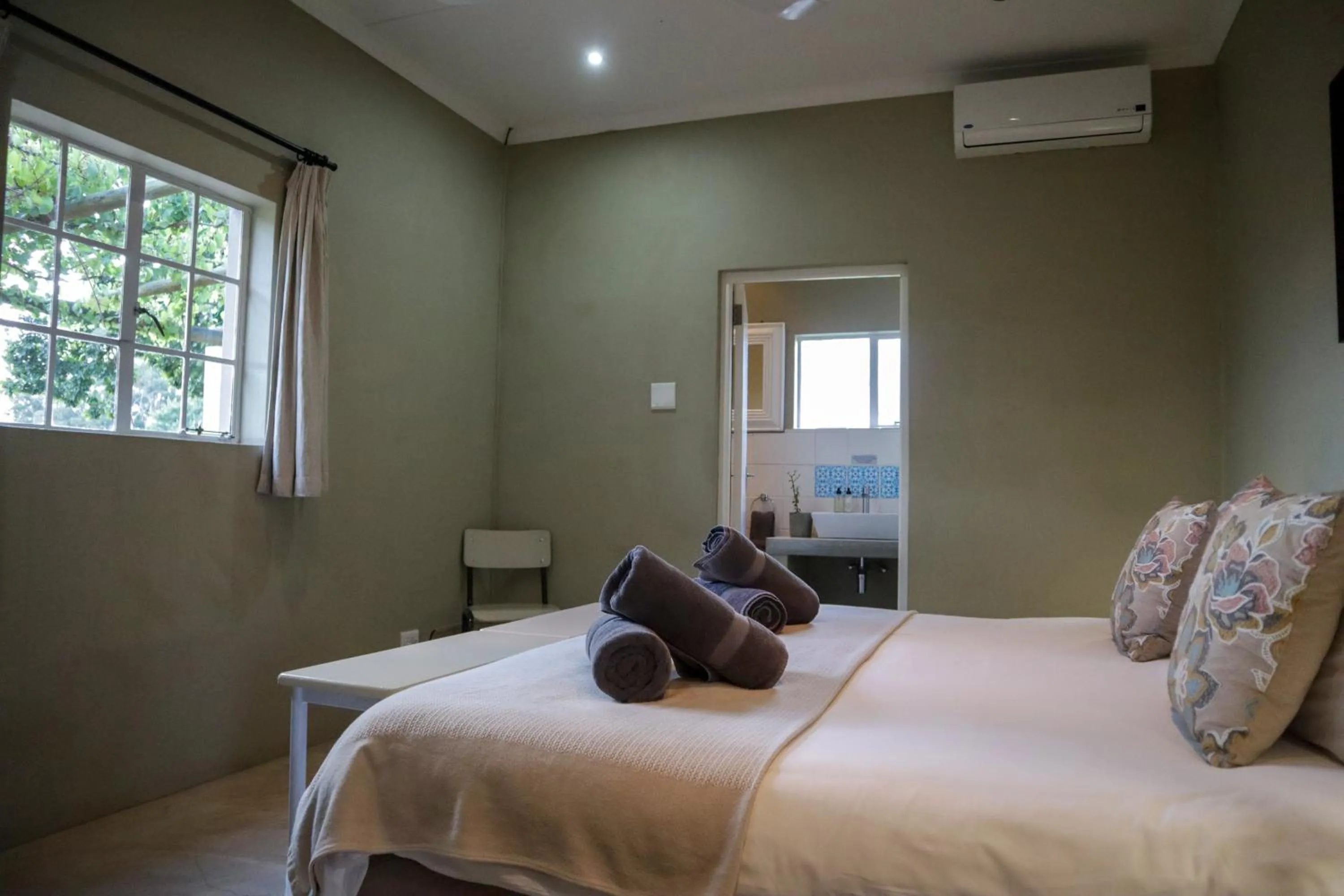 Bed in Saronsberg Vineyard Cottages