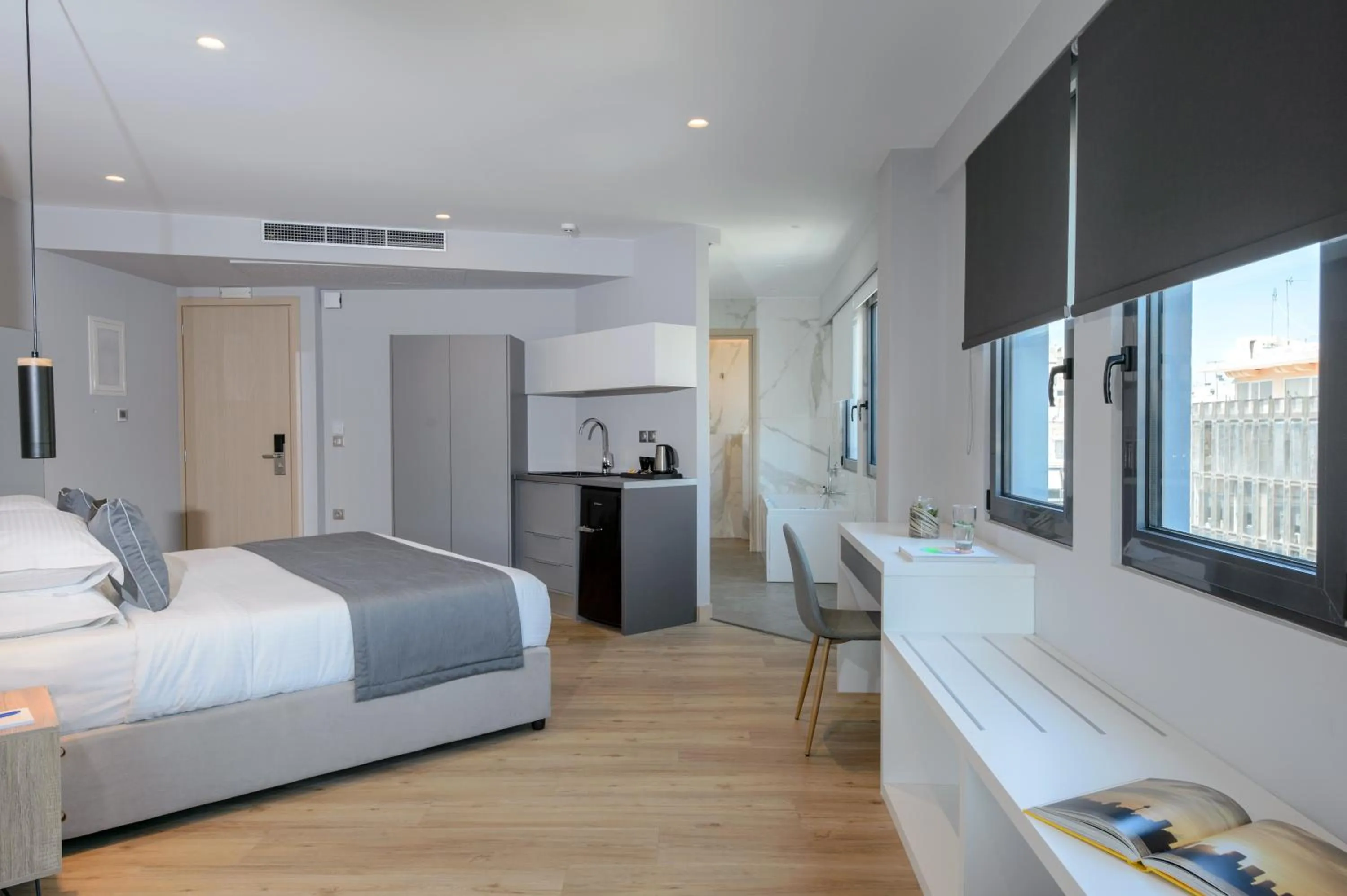 Kitchen or kitchenette, Bed in The Convo Syngrou Apartments