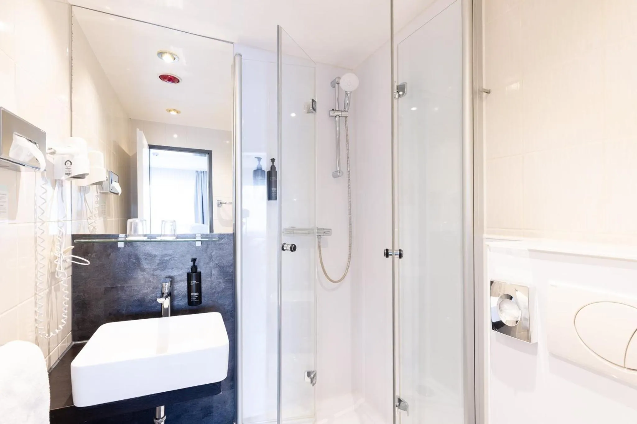 Bathroom in Garner Hotel Bremen North by IHG