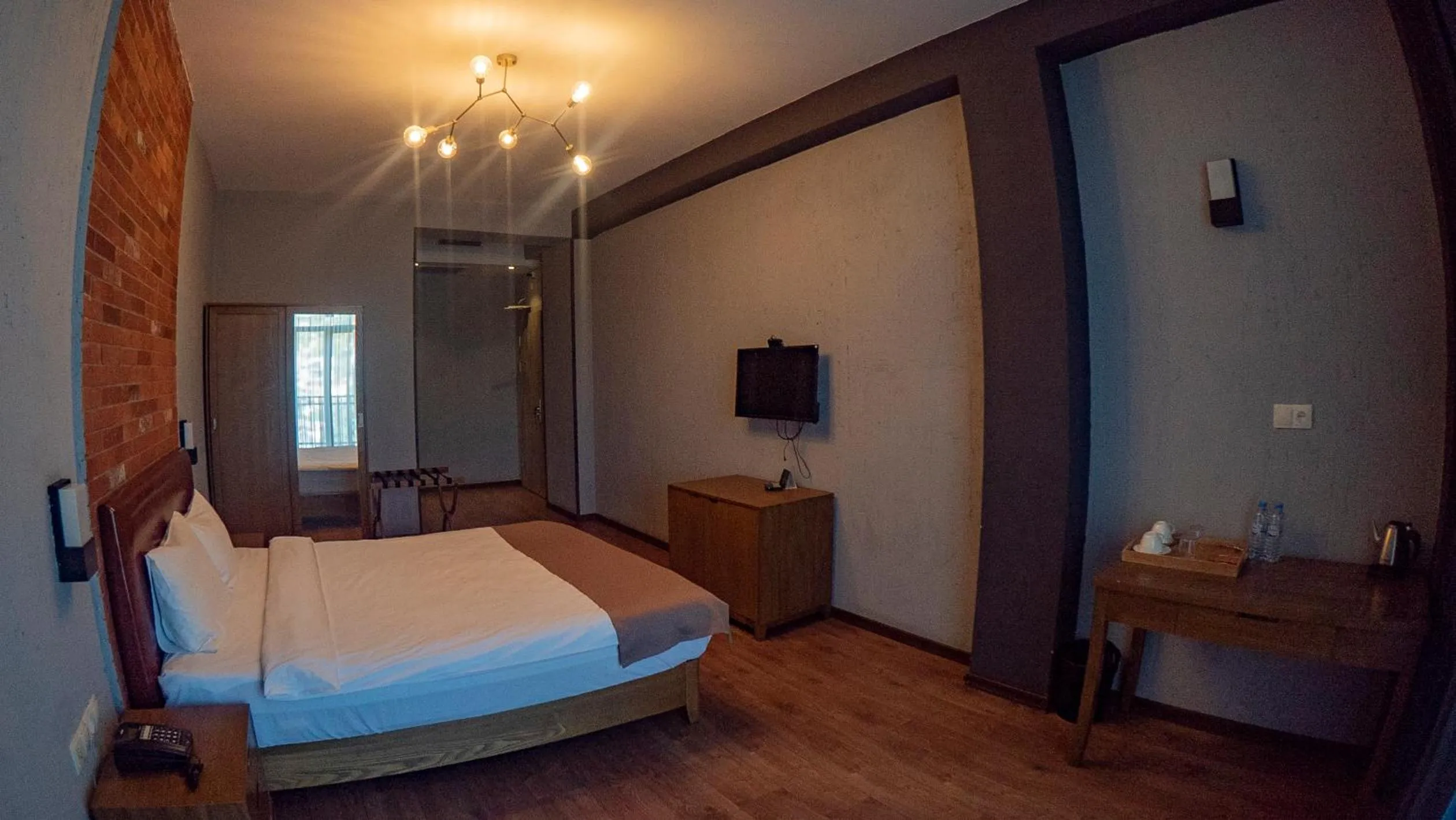 Bed in TM Apart Hotel