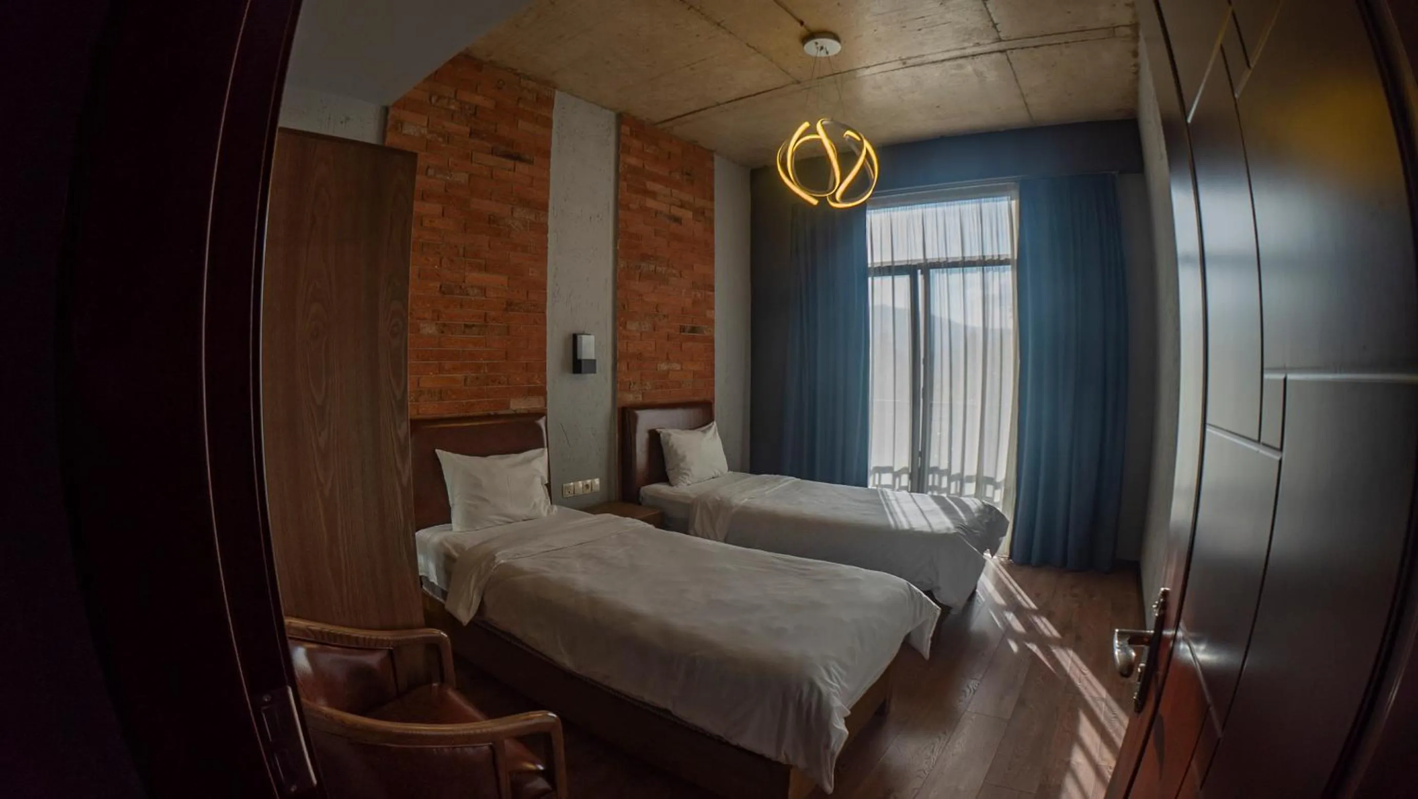 Bed in TM Apart Hotel