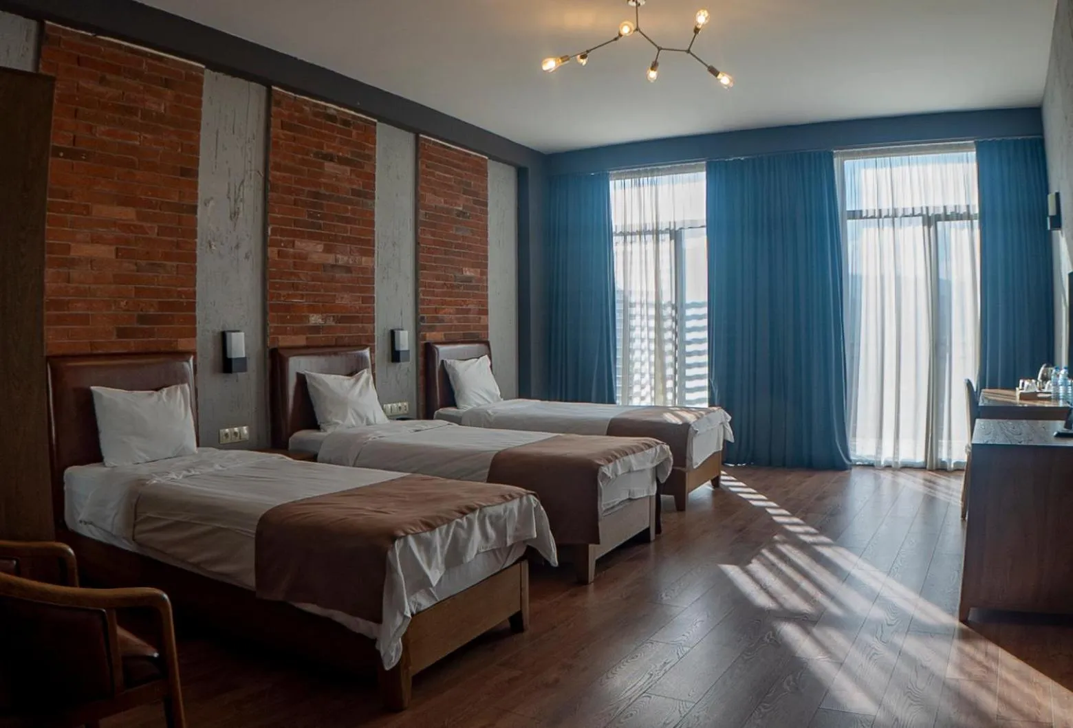 Bed in TM Apart Hotel