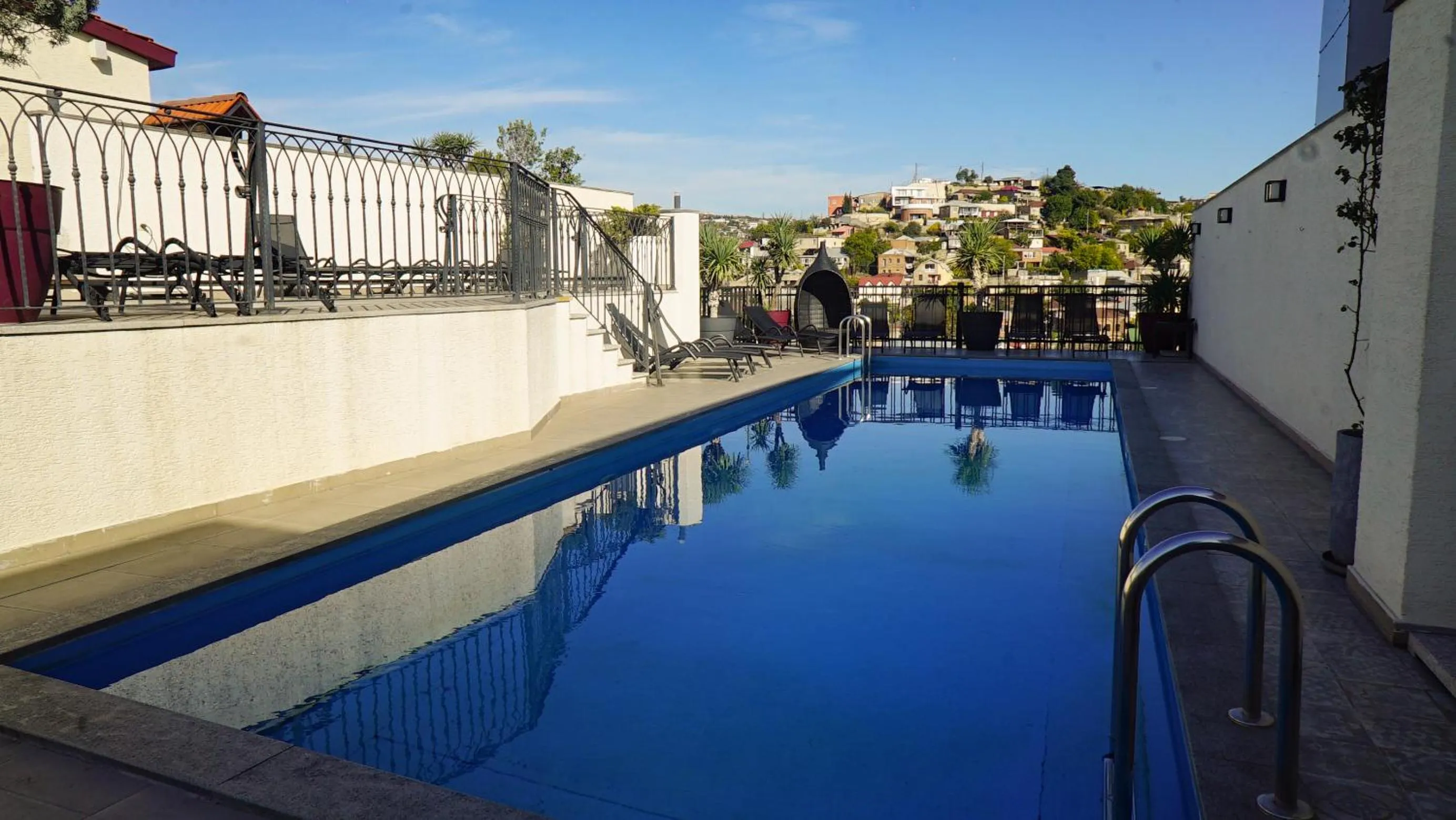 Swimming pool in TM Apart Hotel