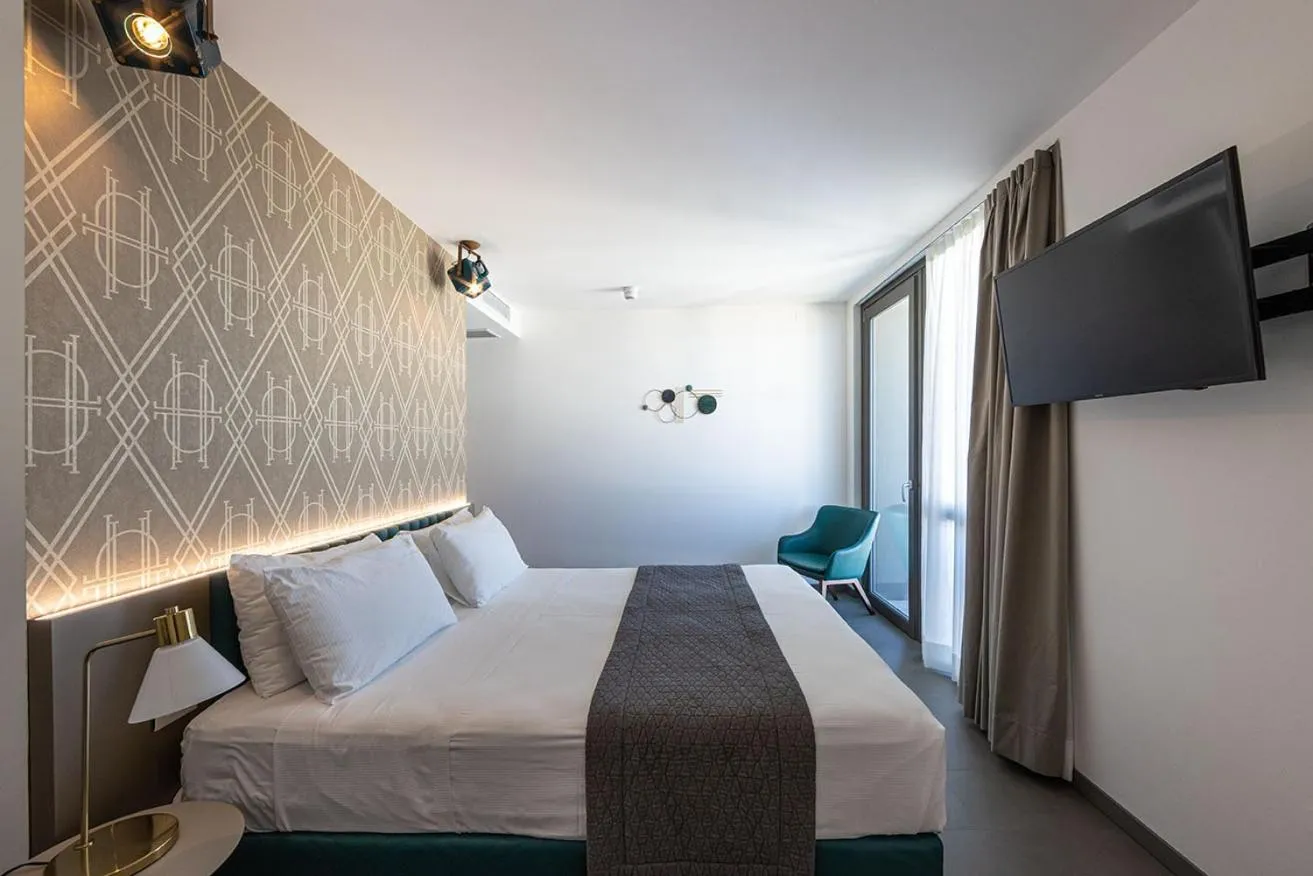 Bed in DIVA HOTEL LIGNANO - Adults Only