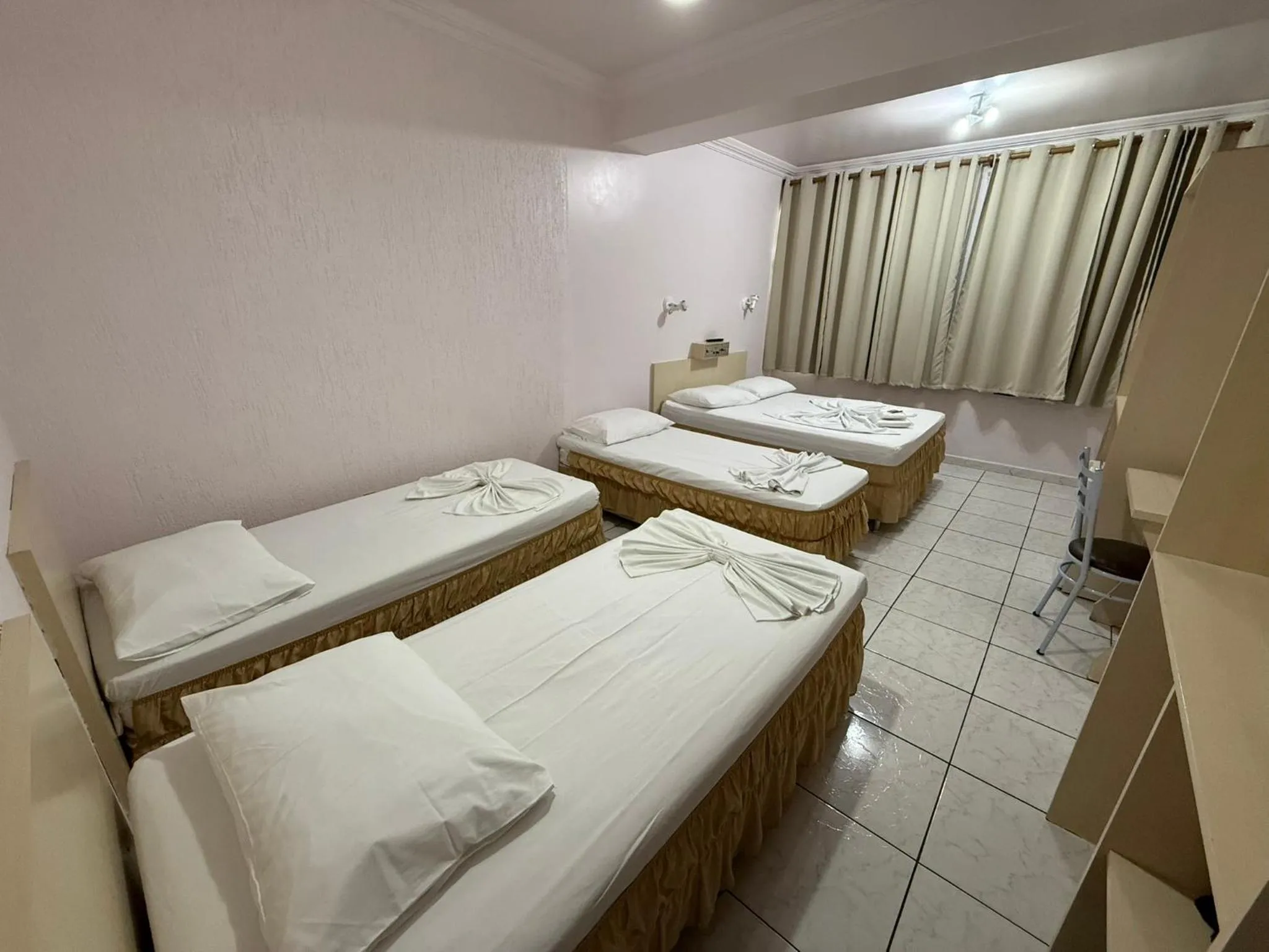 Bed in Oasis Chartouni Hotel