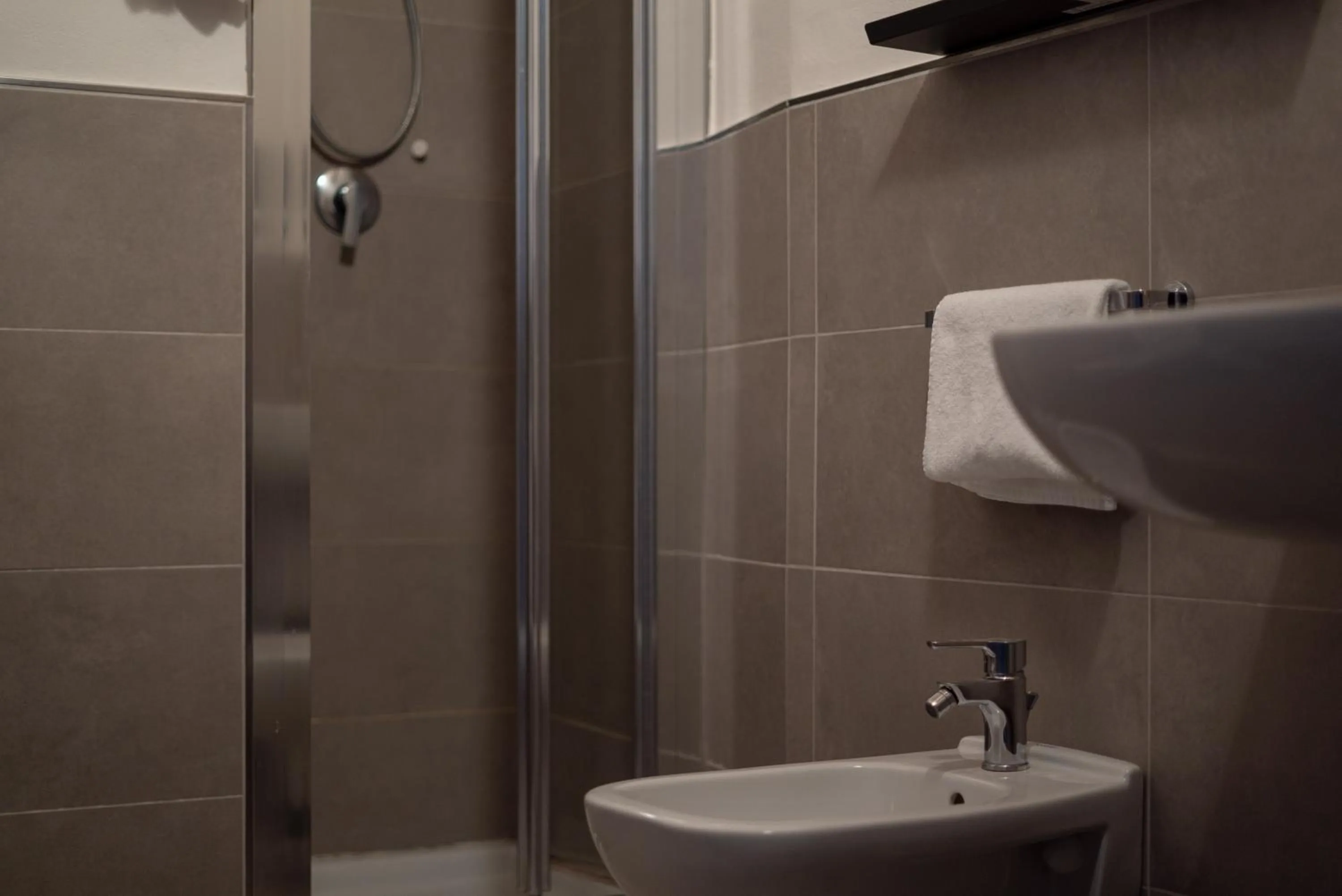 Bathroom in LUOGO COMUNE Ostello