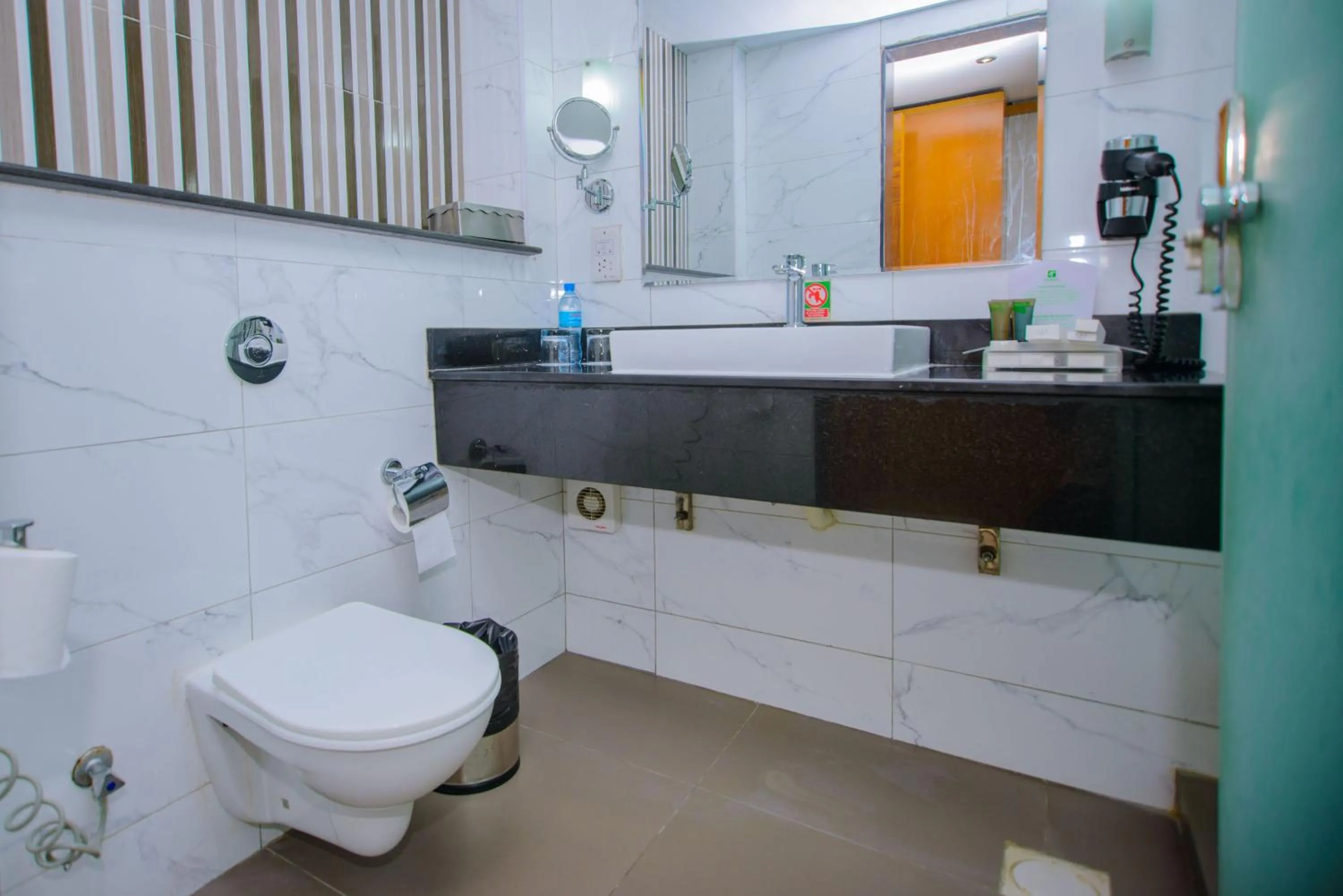 Toilet in Holiday Inn Dar Es Salaam by IHG