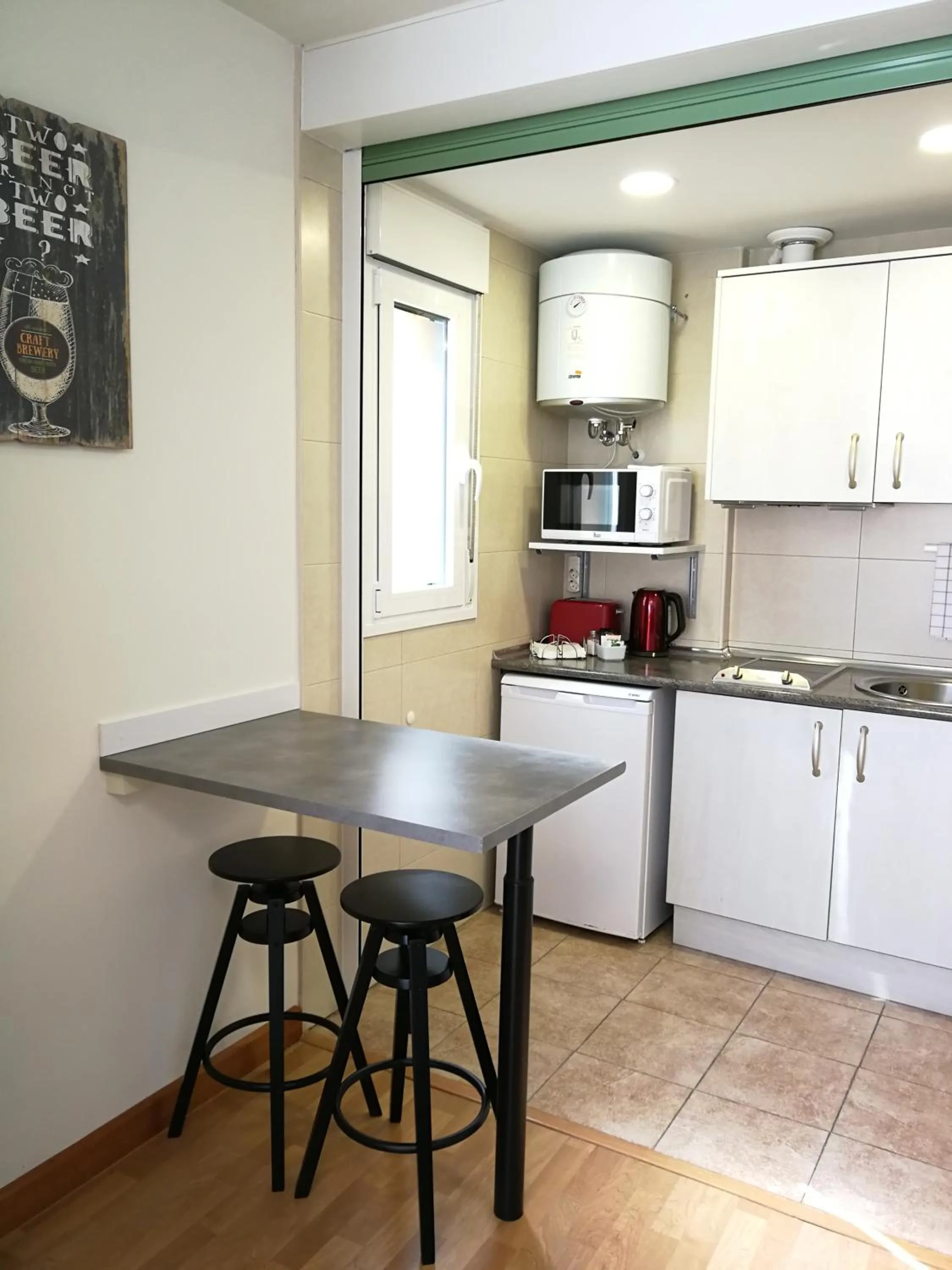 Kitchen or kitchenette in Hotel Apartamentos Aralso