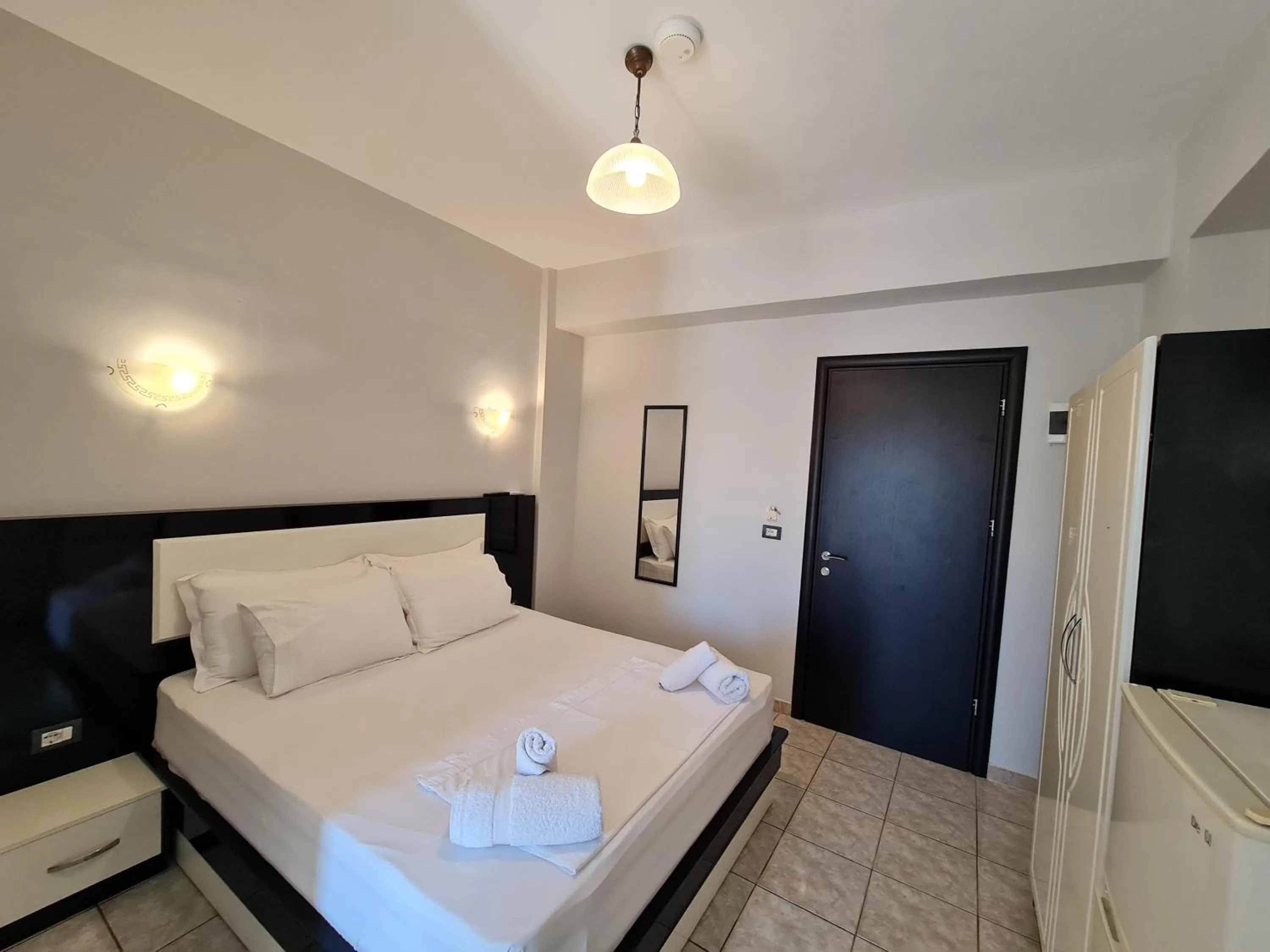 Bed in Hotel Ardiani