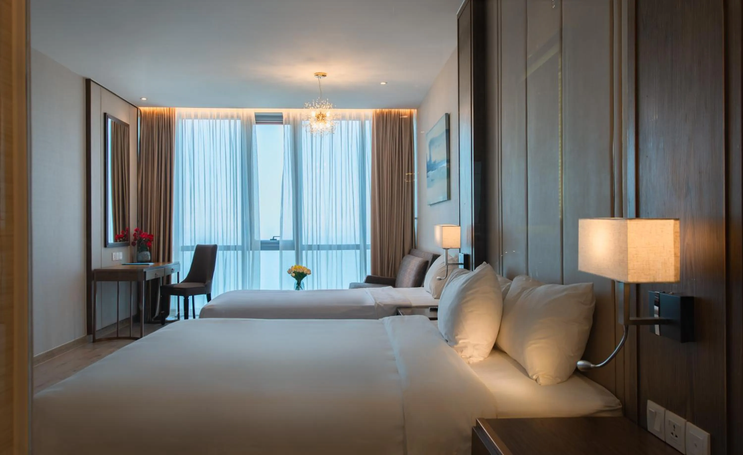 Bed in PANORAMA Condotel by HLG