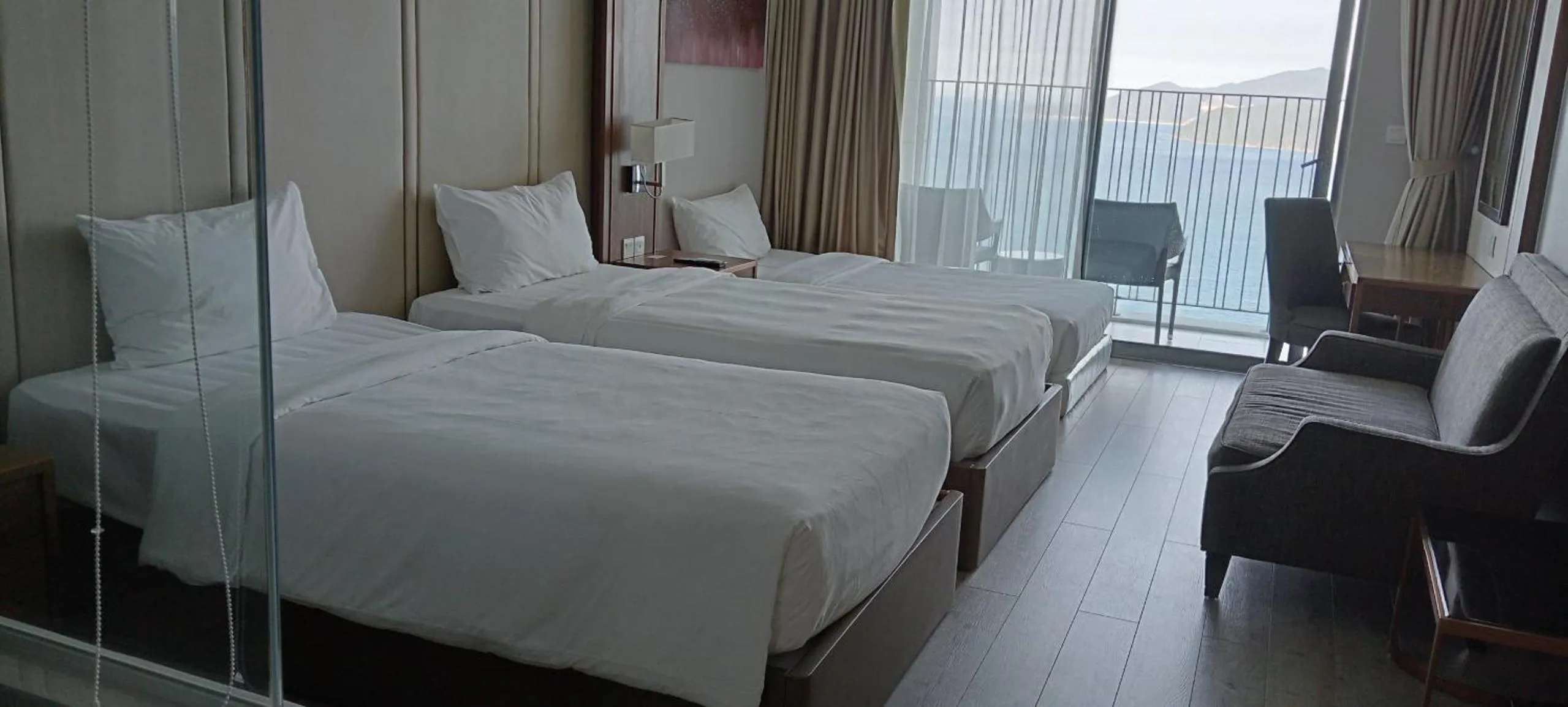 Bed in PANORAMA Condotel by HLG