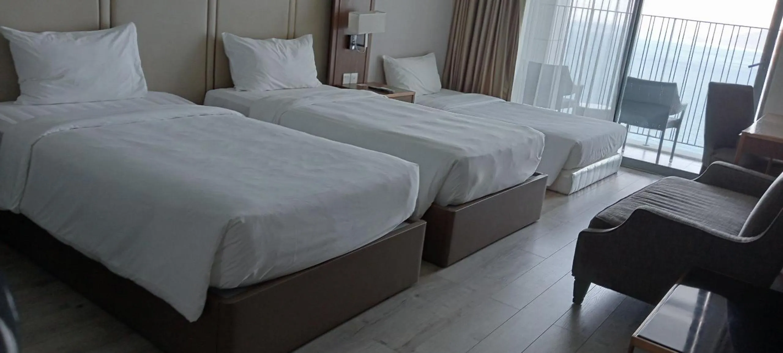Bed in PANORAMA Condotel by HLG