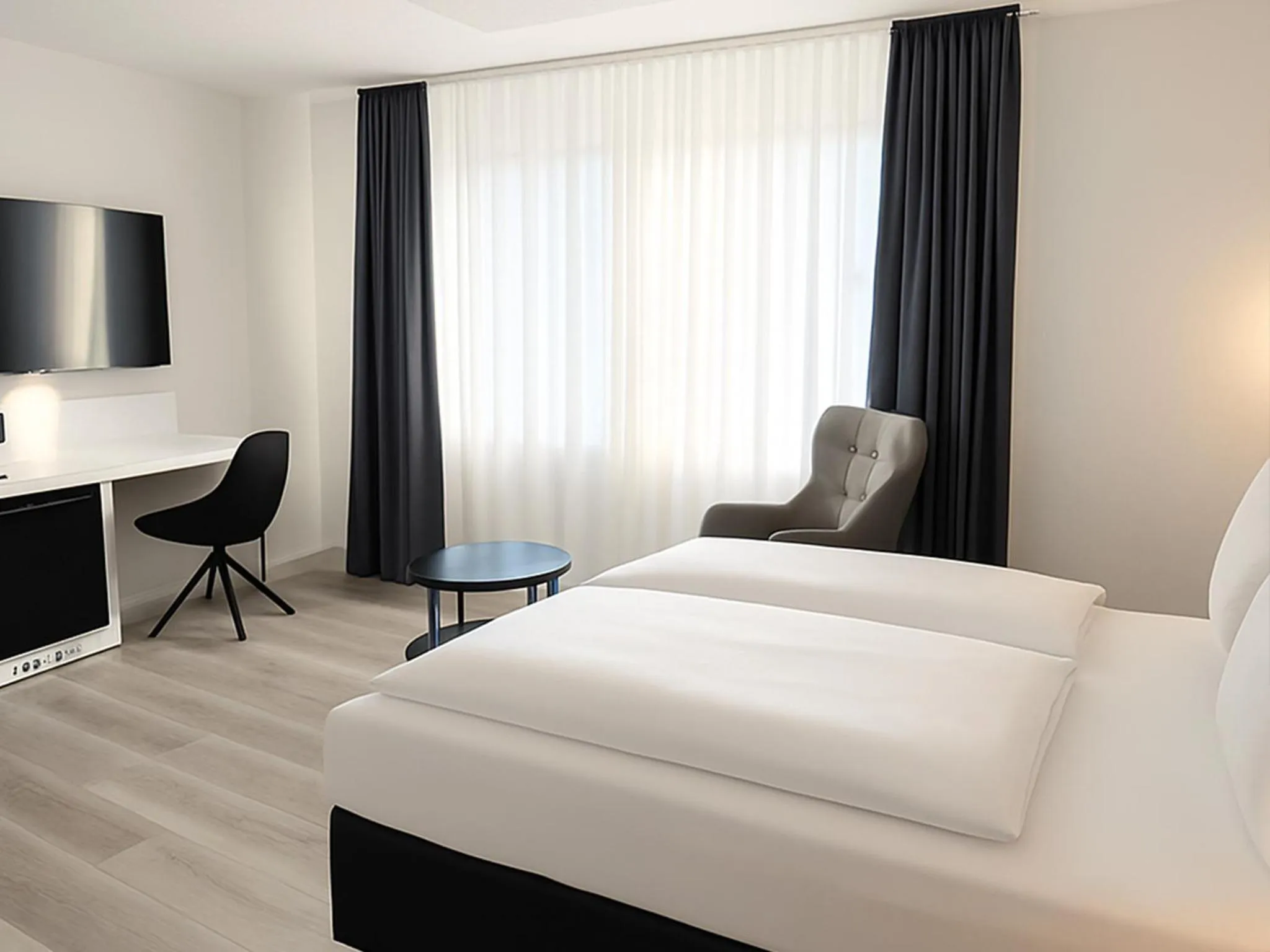 Photo of the whole room, Bed in DORMERO Hotel Dessau-Roßlau