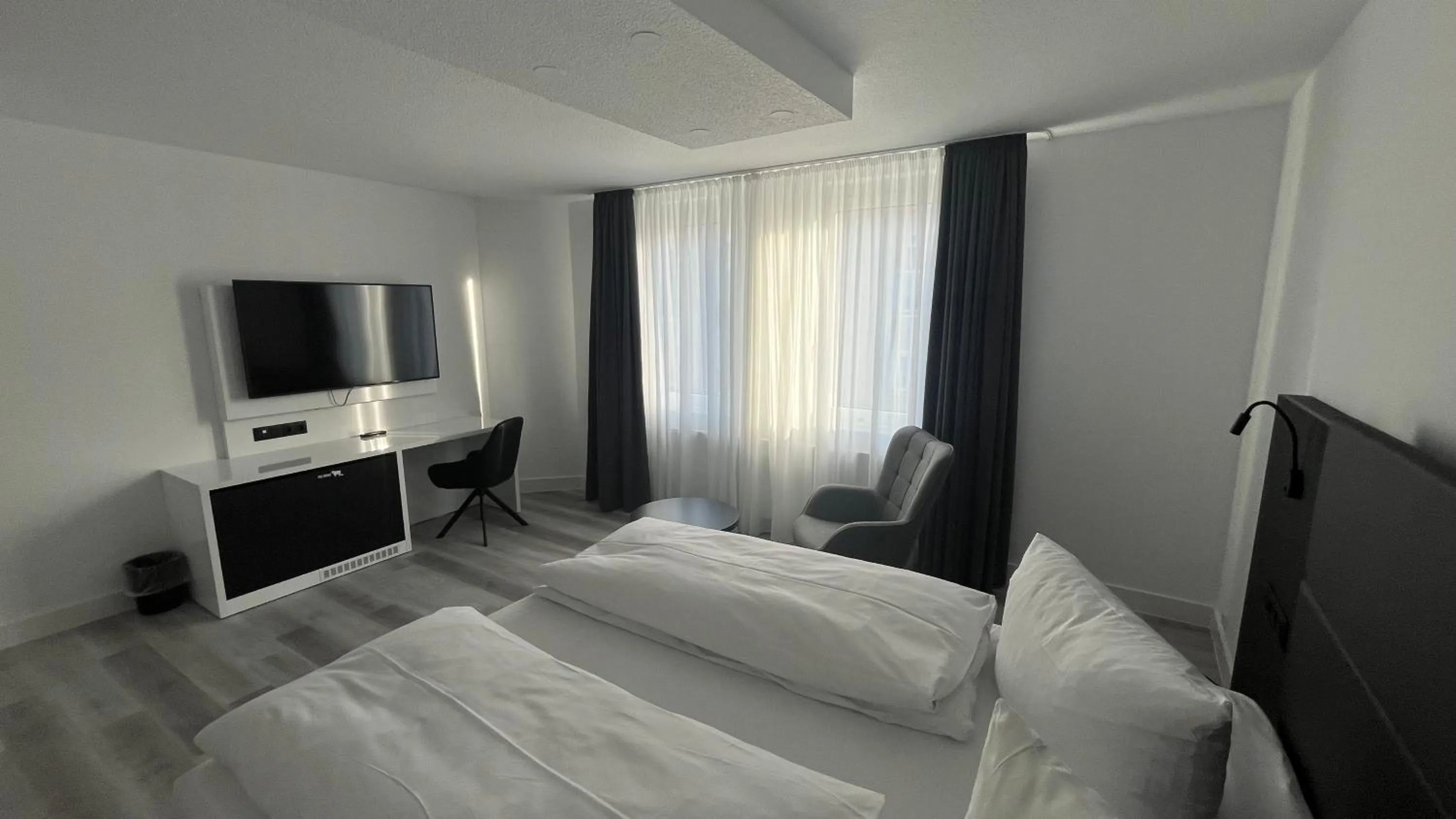 Photo of the whole room, Bed in DORMERO Hotel Dessau-Roßlau