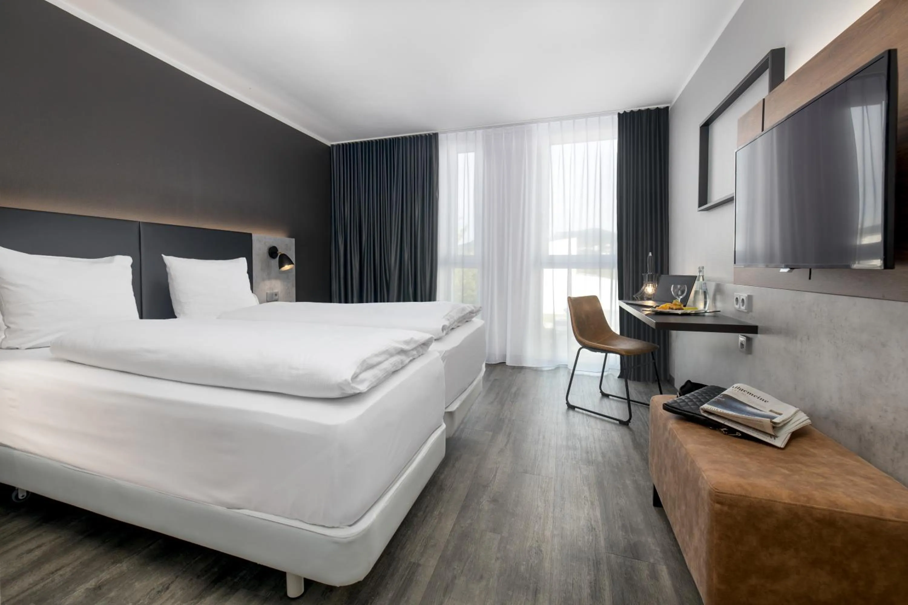 Photo of the whole room, Bed in SCOTTY & PAUL Hotel Deggendorf