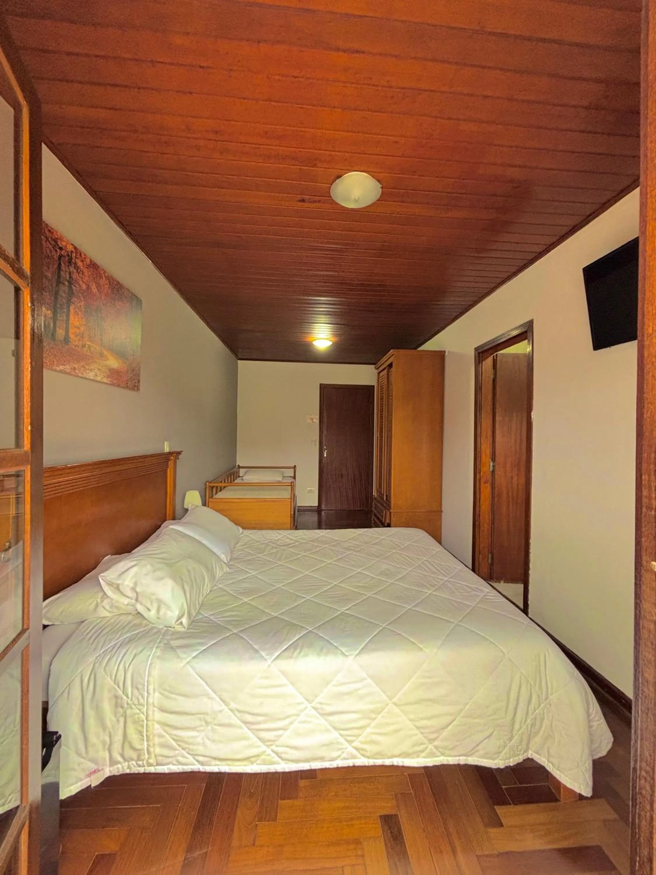 Photo of the whole room, Bed in Pousada Portal da Serra