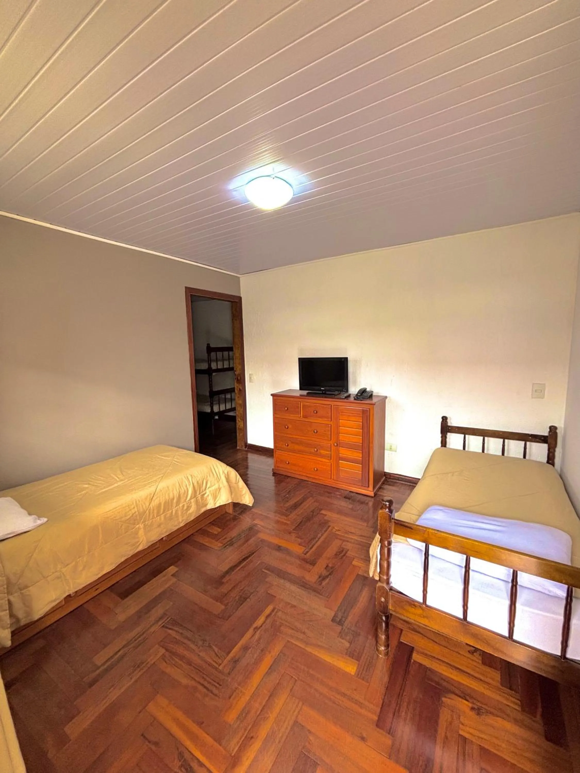 Bed in Pousada Portal da Serra