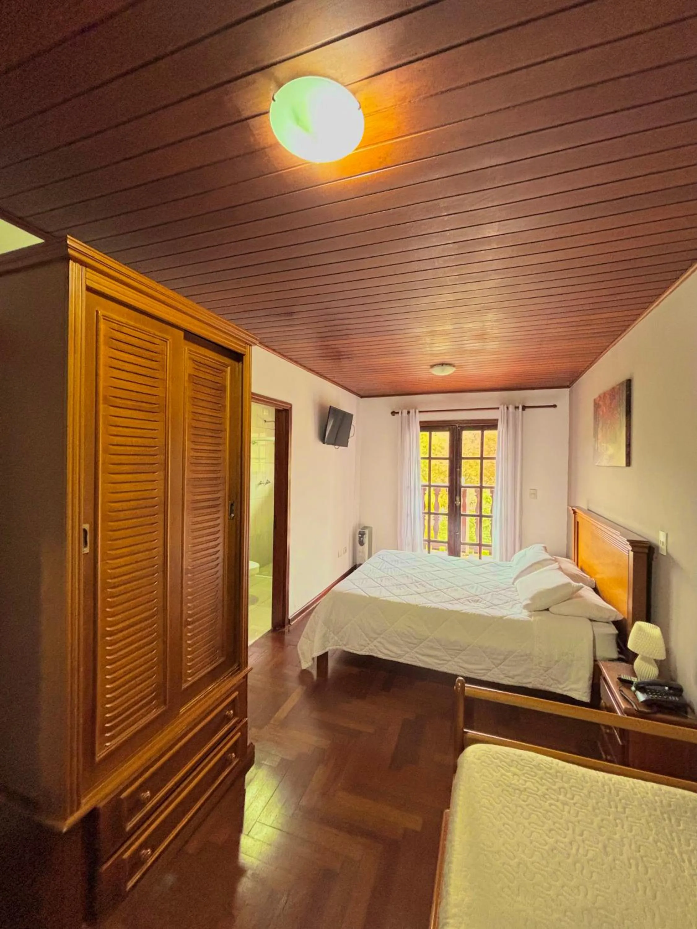 Photo of the whole room, Bed in Pousada Portal da Serra