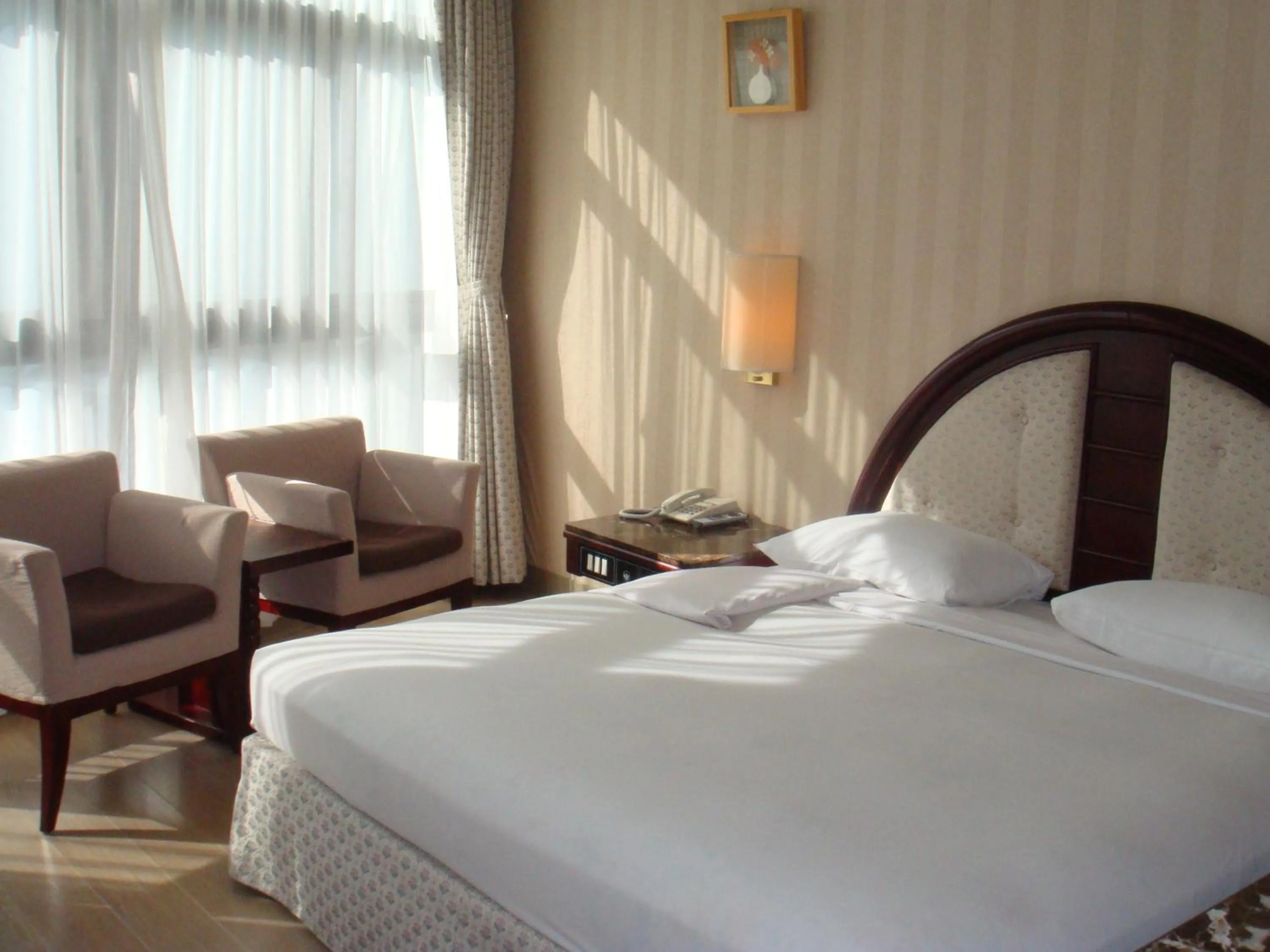 Bed in Honey Moon Hotel