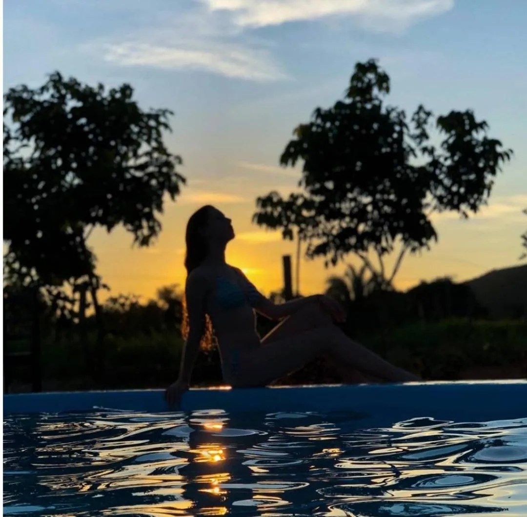 Swimming pool in Pousada do Nondas