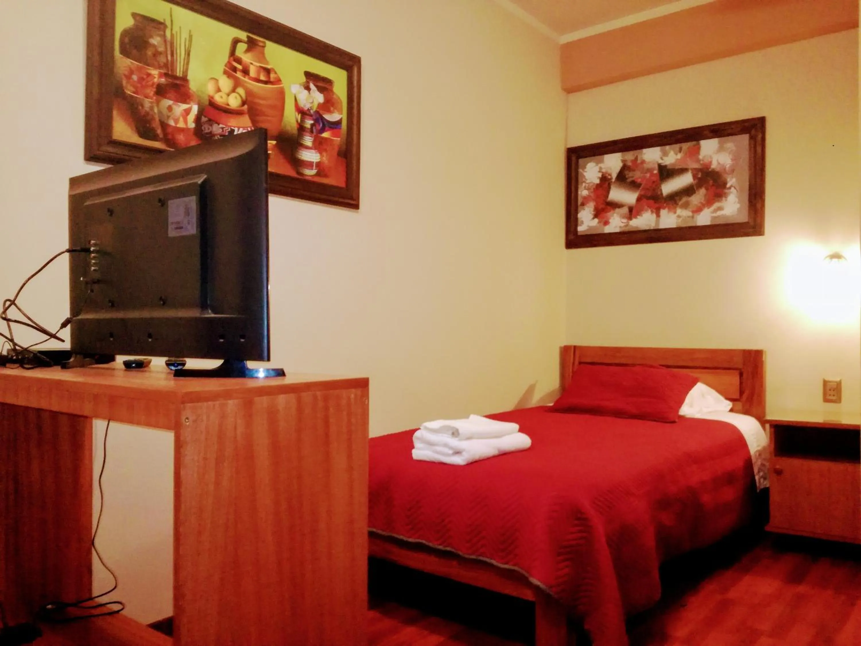 Bed in Hostal Cagnapa Restobar