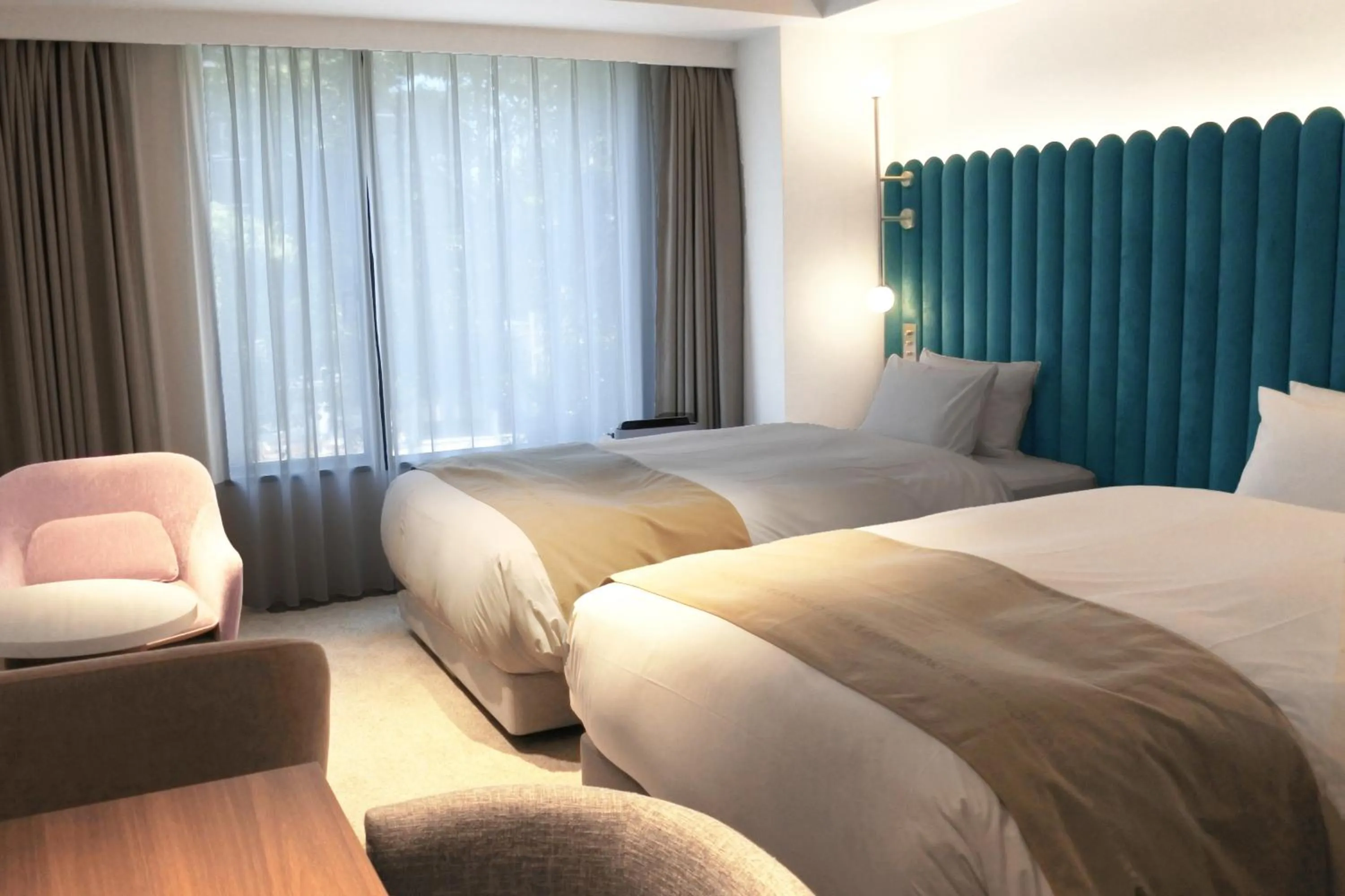 Photo of the whole room, Bed in The Knot Hiroshima