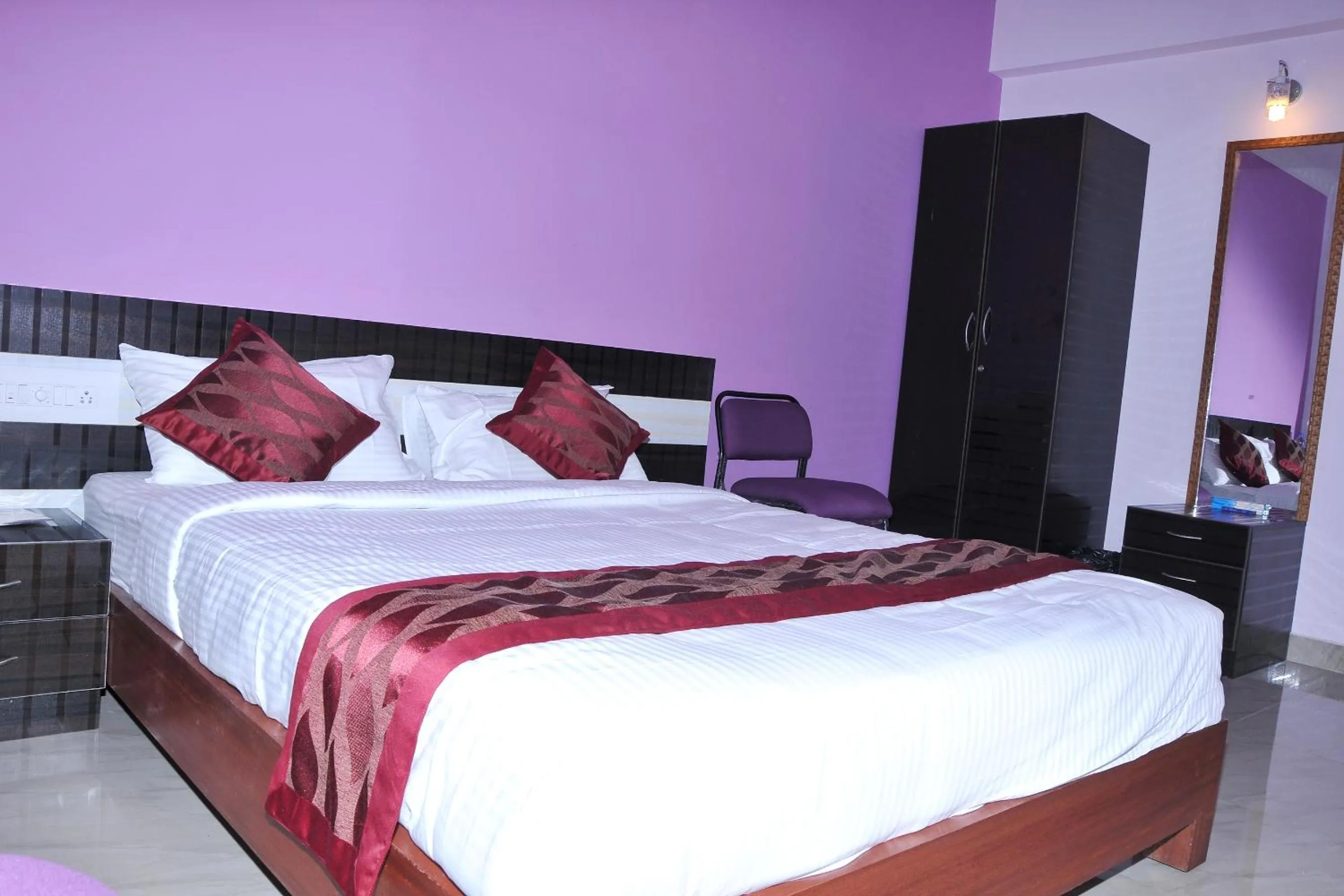 Bed in Brahma Inn