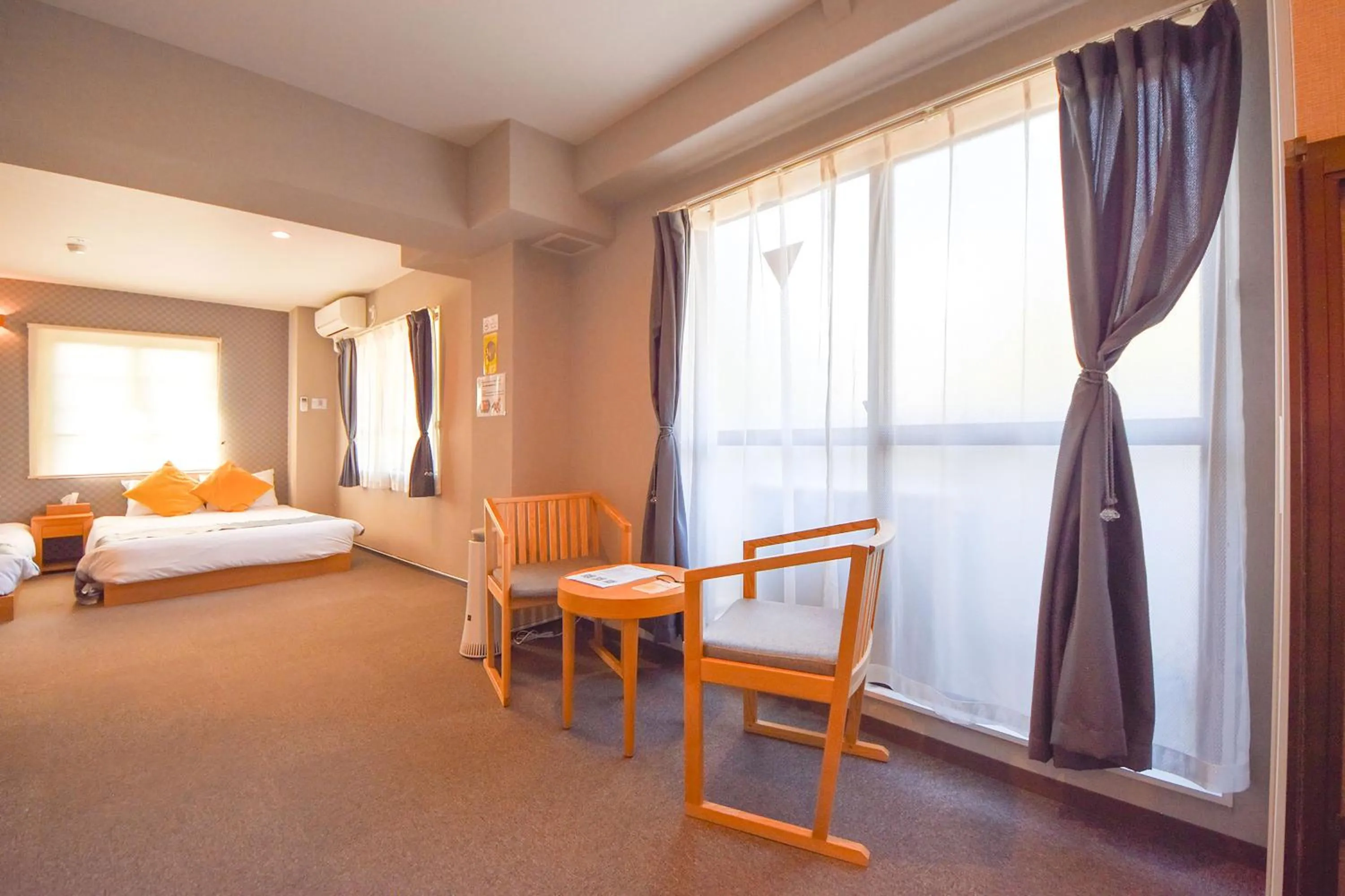 Living room, Bed in Hotel Neiraku