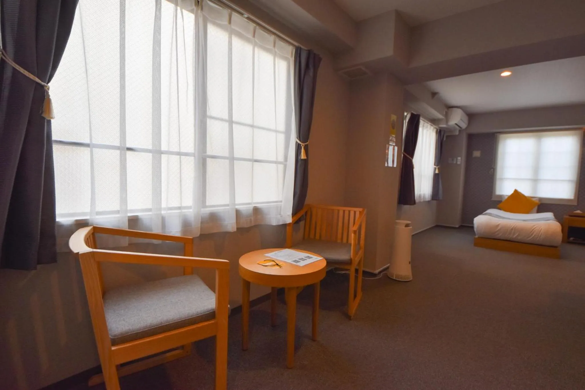 Living room, Bed in Hotel Neiraku