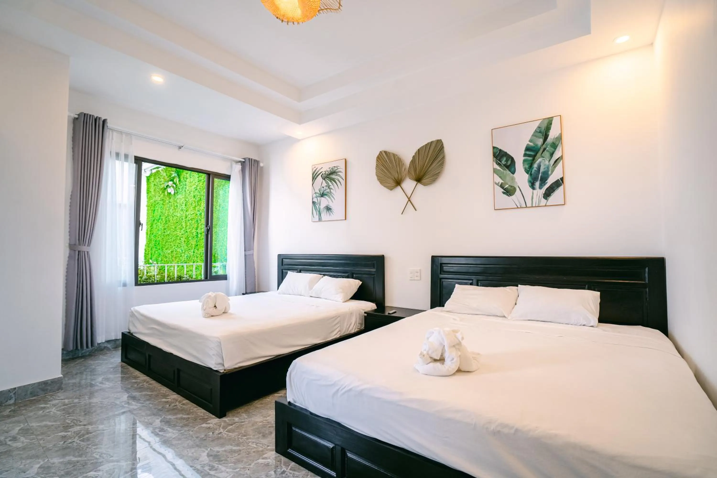 Bed in Beach Palm Villa Hoi An