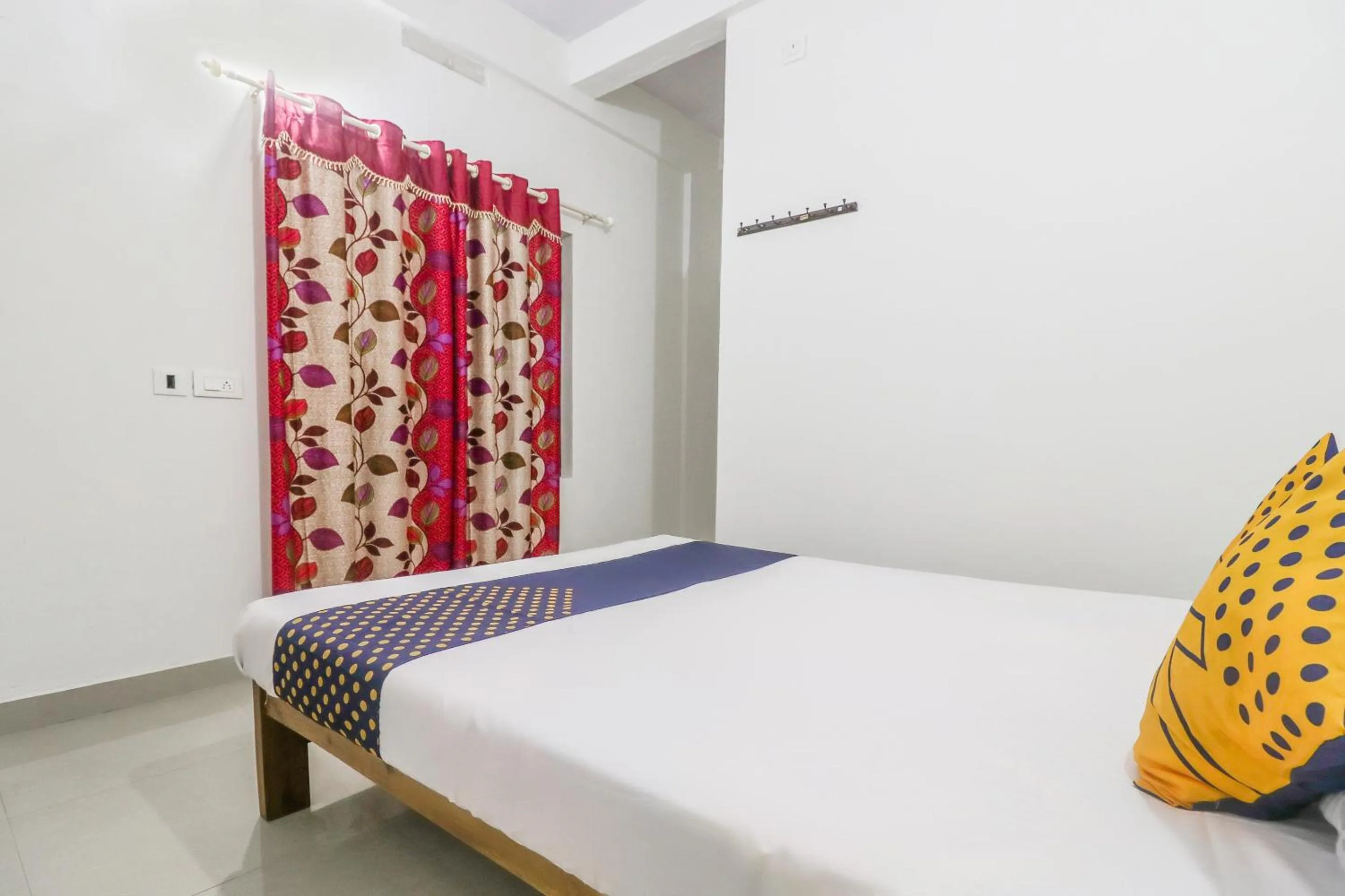 Bedroom, Bed in SPOT ON Rohini Inn Kadampuzha