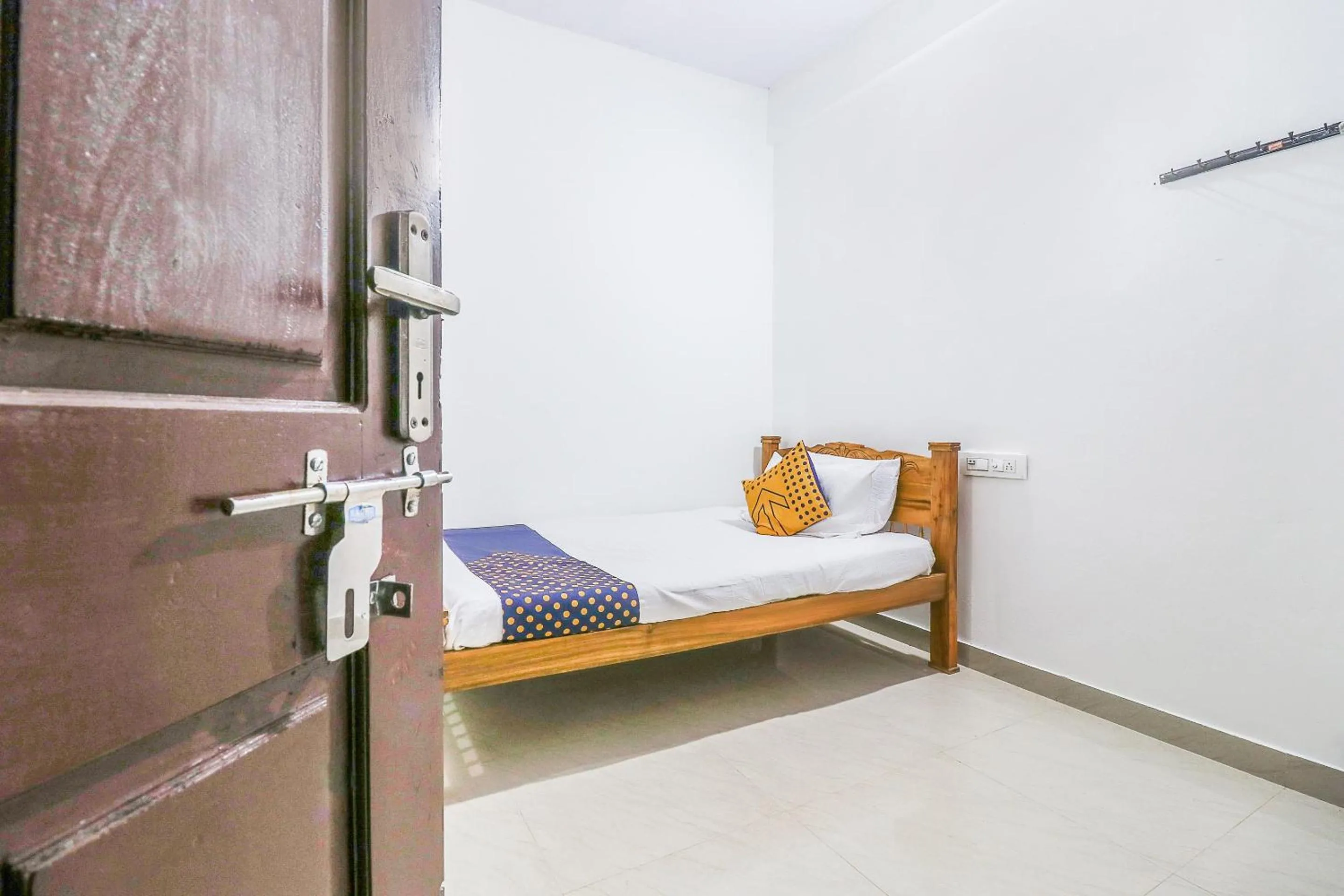 Bedroom, Bed in SPOT ON Rohini Inn Kadampuzha