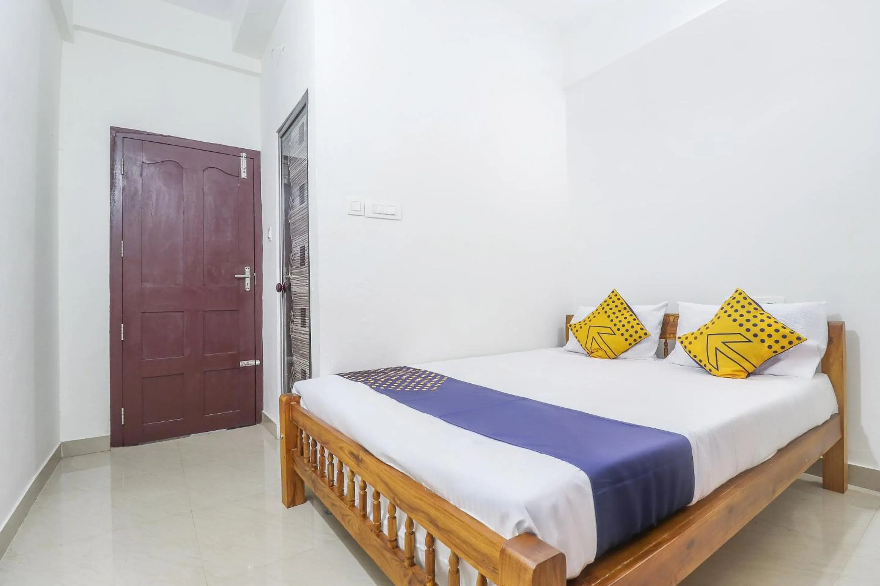Bedroom, Bed in SPOT ON Rohini Inn Kadampuzha