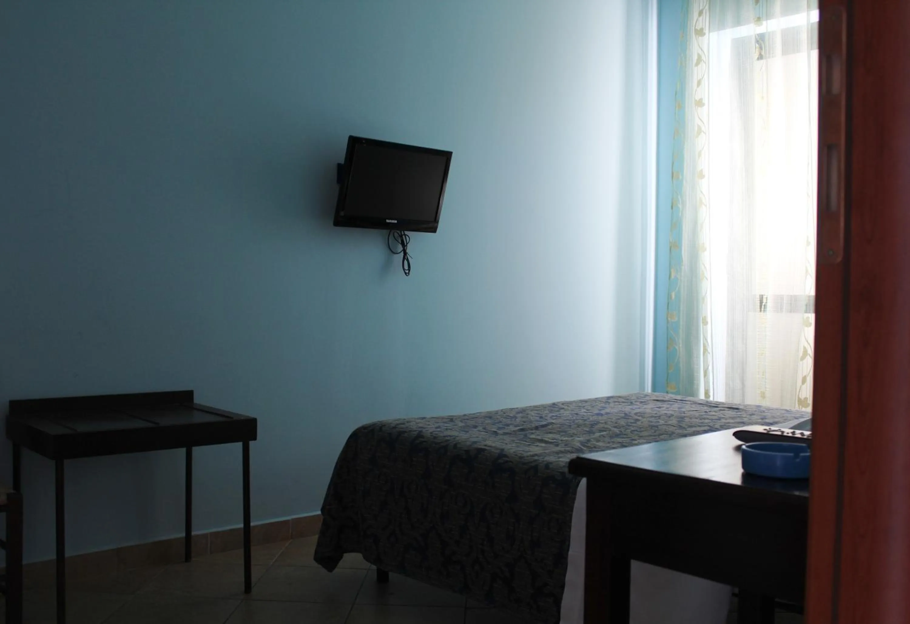 Bedroom in Hotel 106