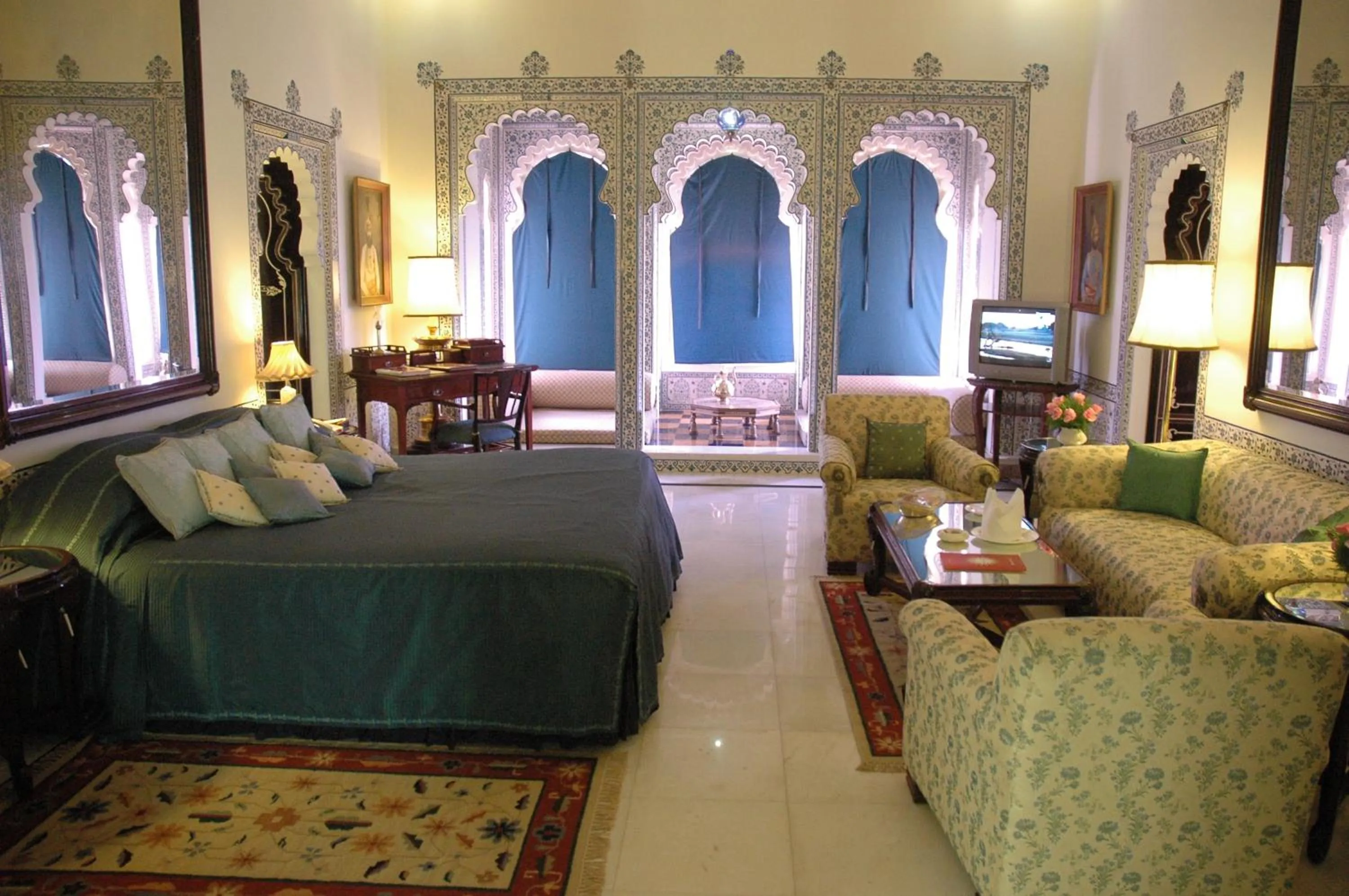 Seating area, Bed in Shiv Niwas Palace by HRH Group of Hotels