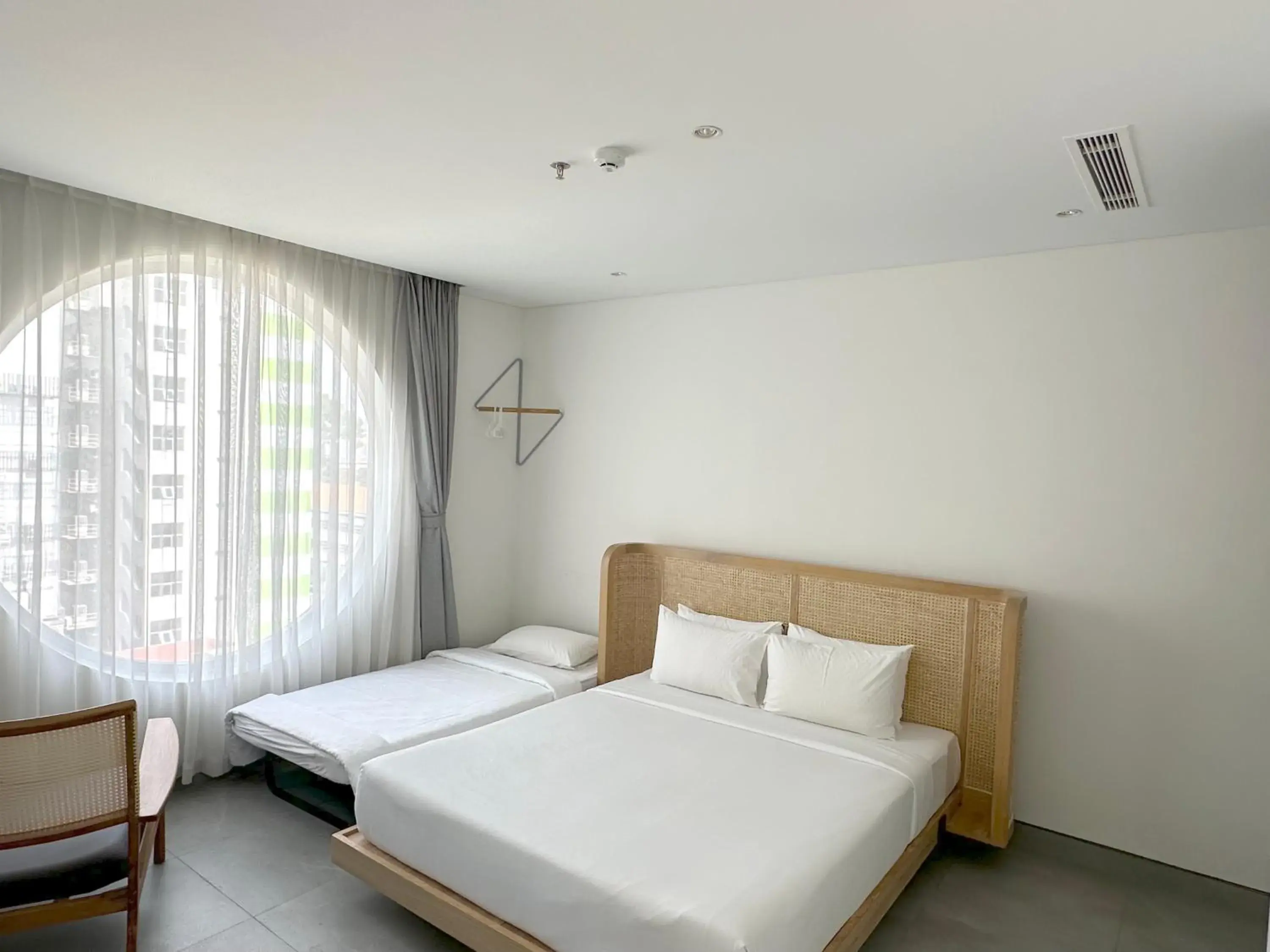 Triple Room with City View in MEANDER Saigon Triple Room with City View in MEANDER Saigon