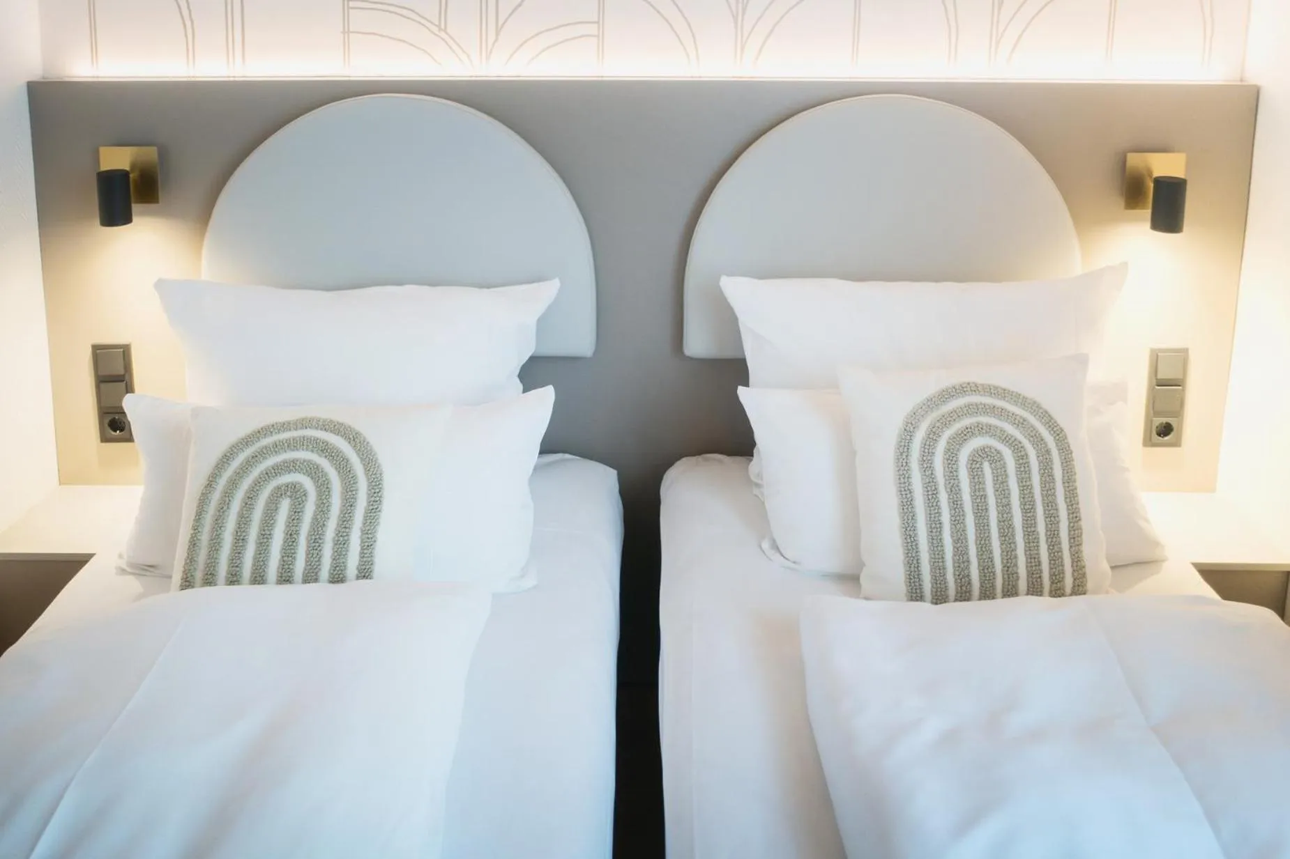 Bed in guestified BARBAROSSA Hotel