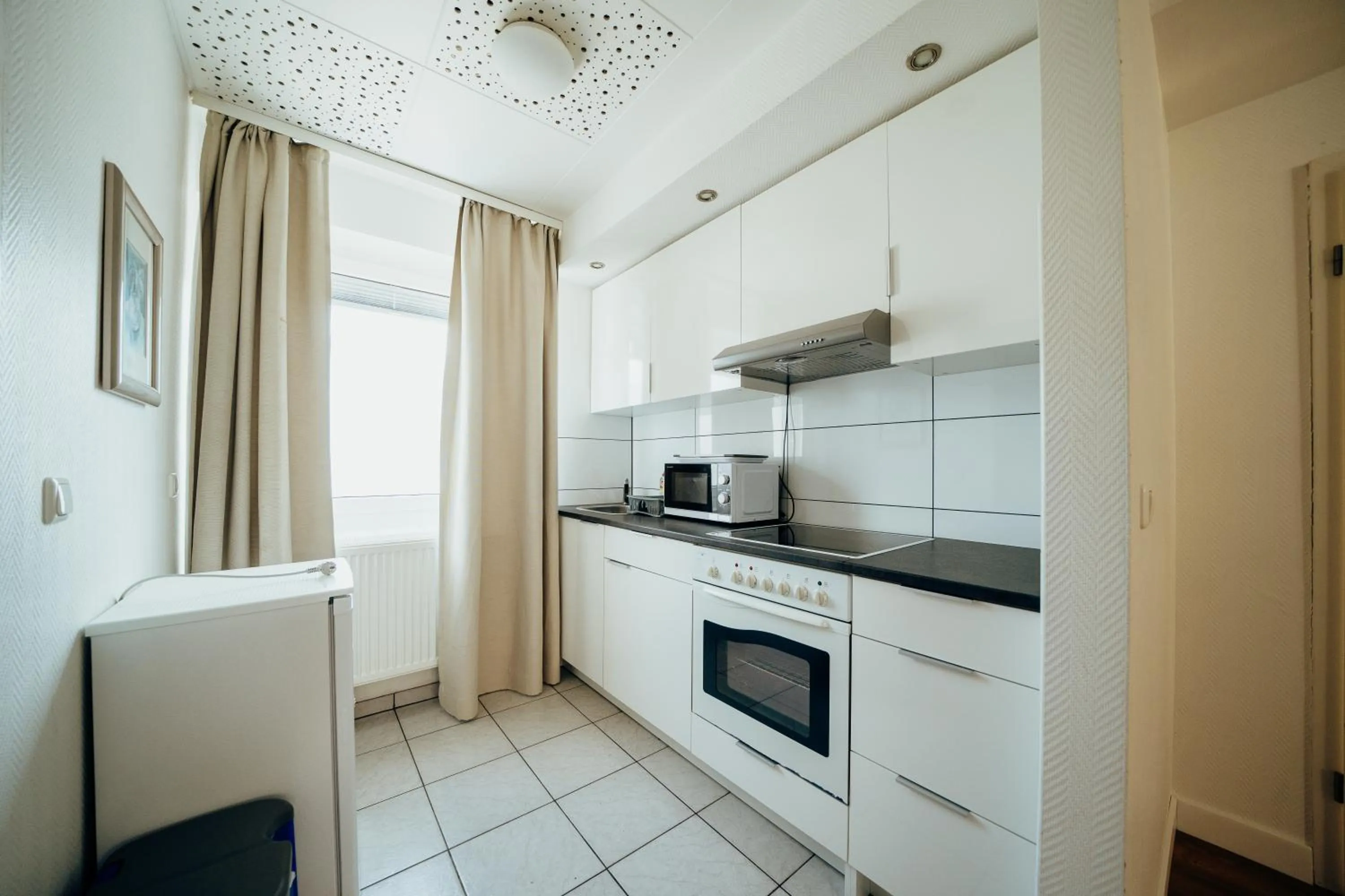 Kitchen or kitchenette in guestified BARBAROSSA Hotel