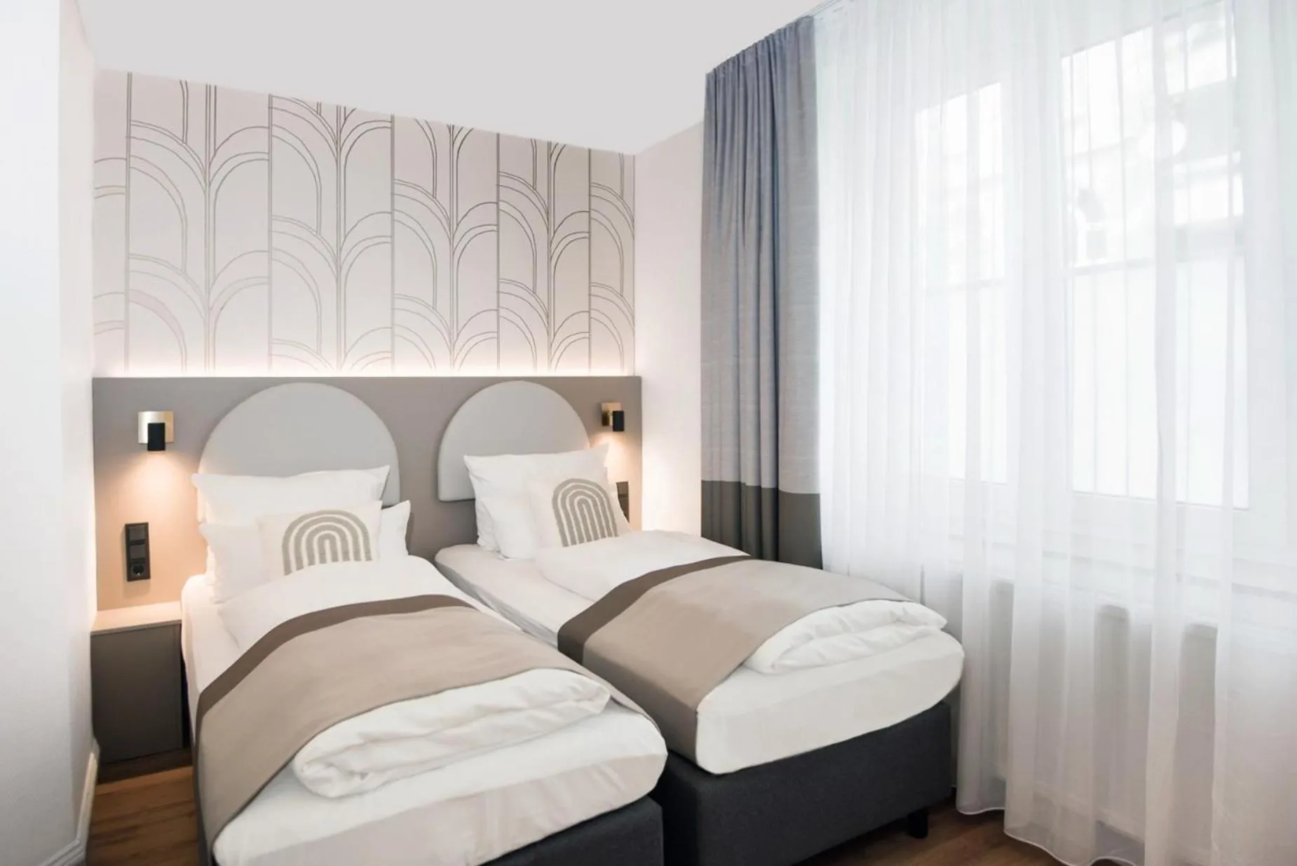 Bed in guestified BARBAROSSA Hotel