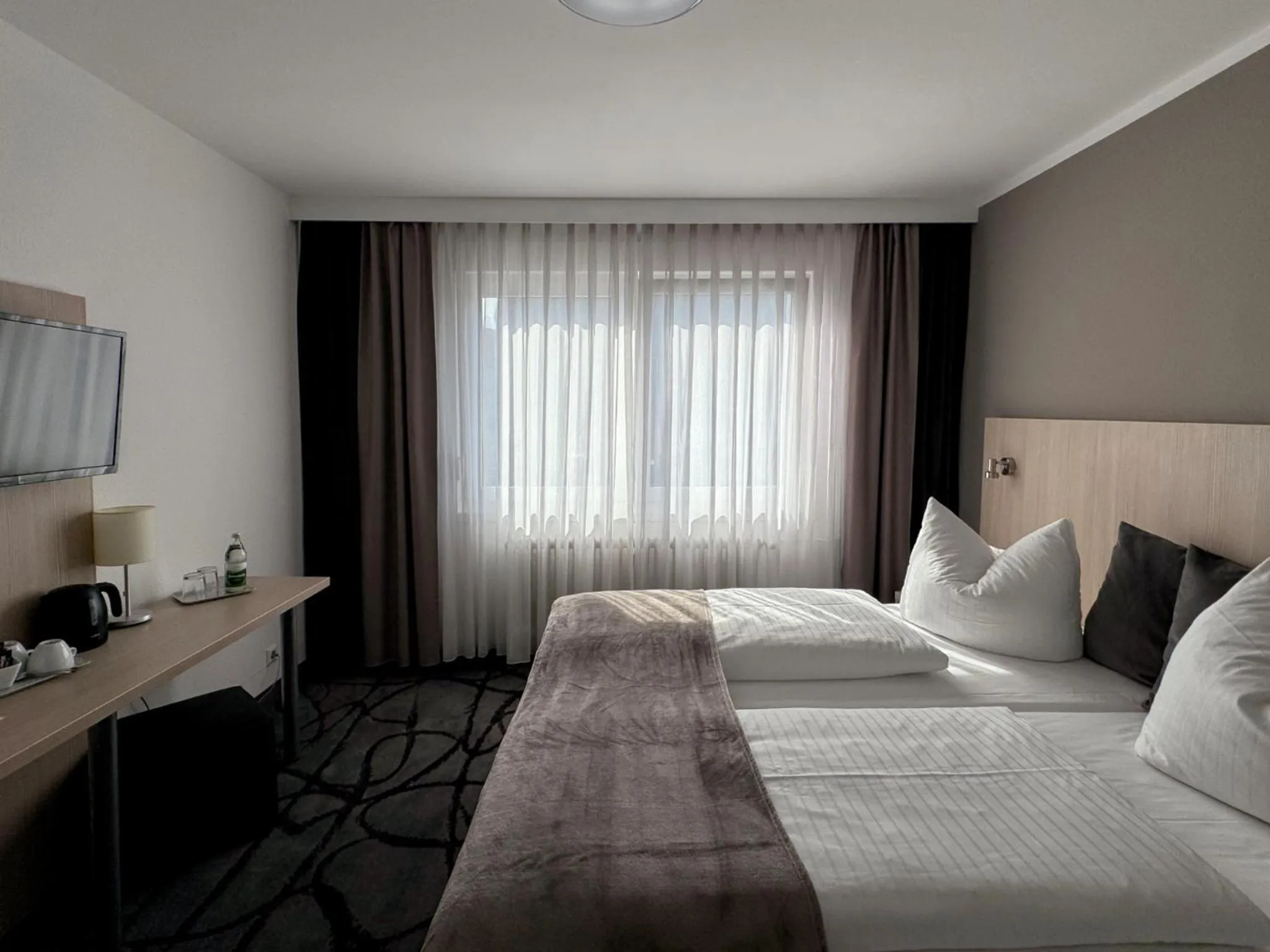 Photo of the whole room, Bed in Eisberg Hotel Schwanen