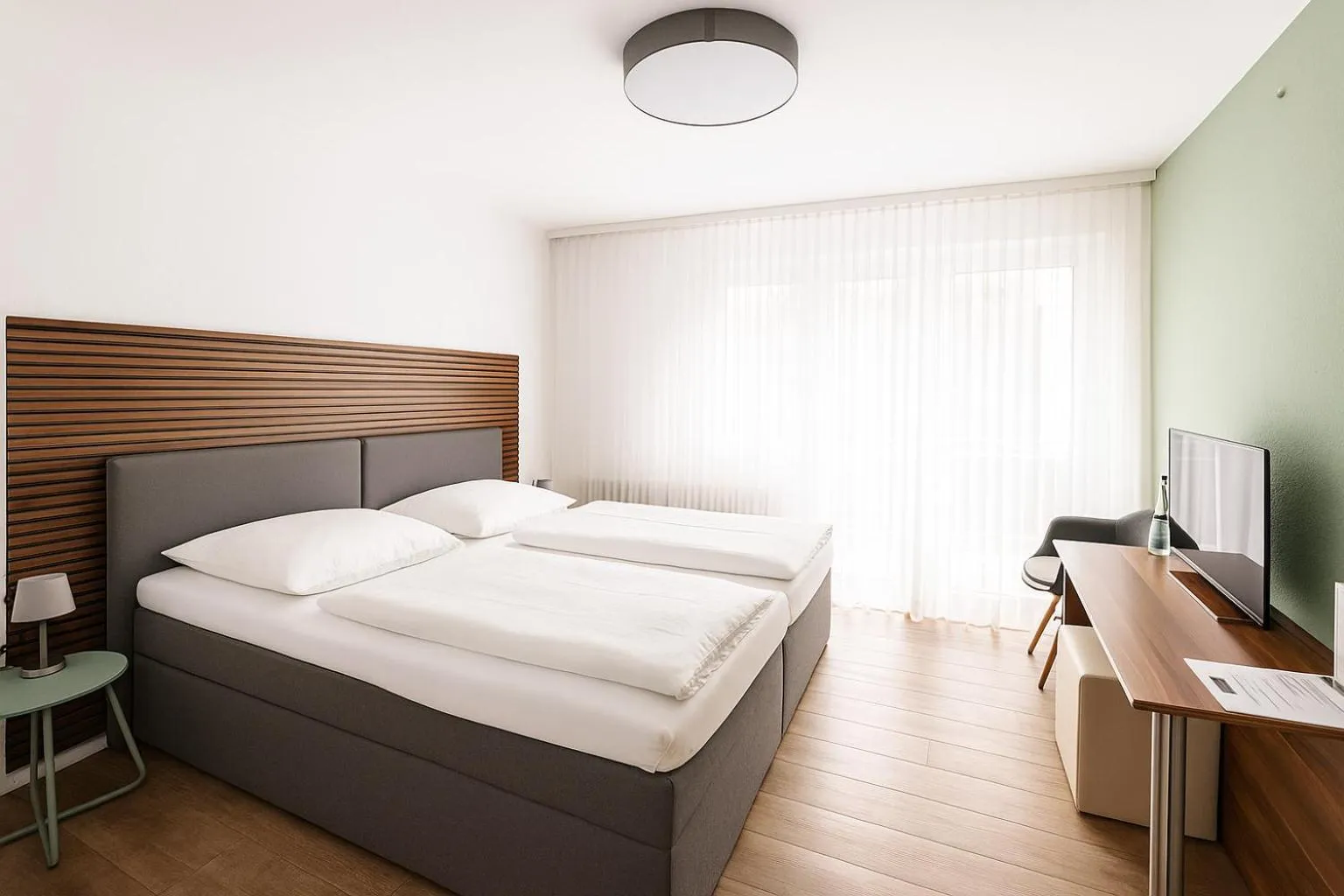 Photo of the whole room, Bed in Eisberg Hotel Schwanen